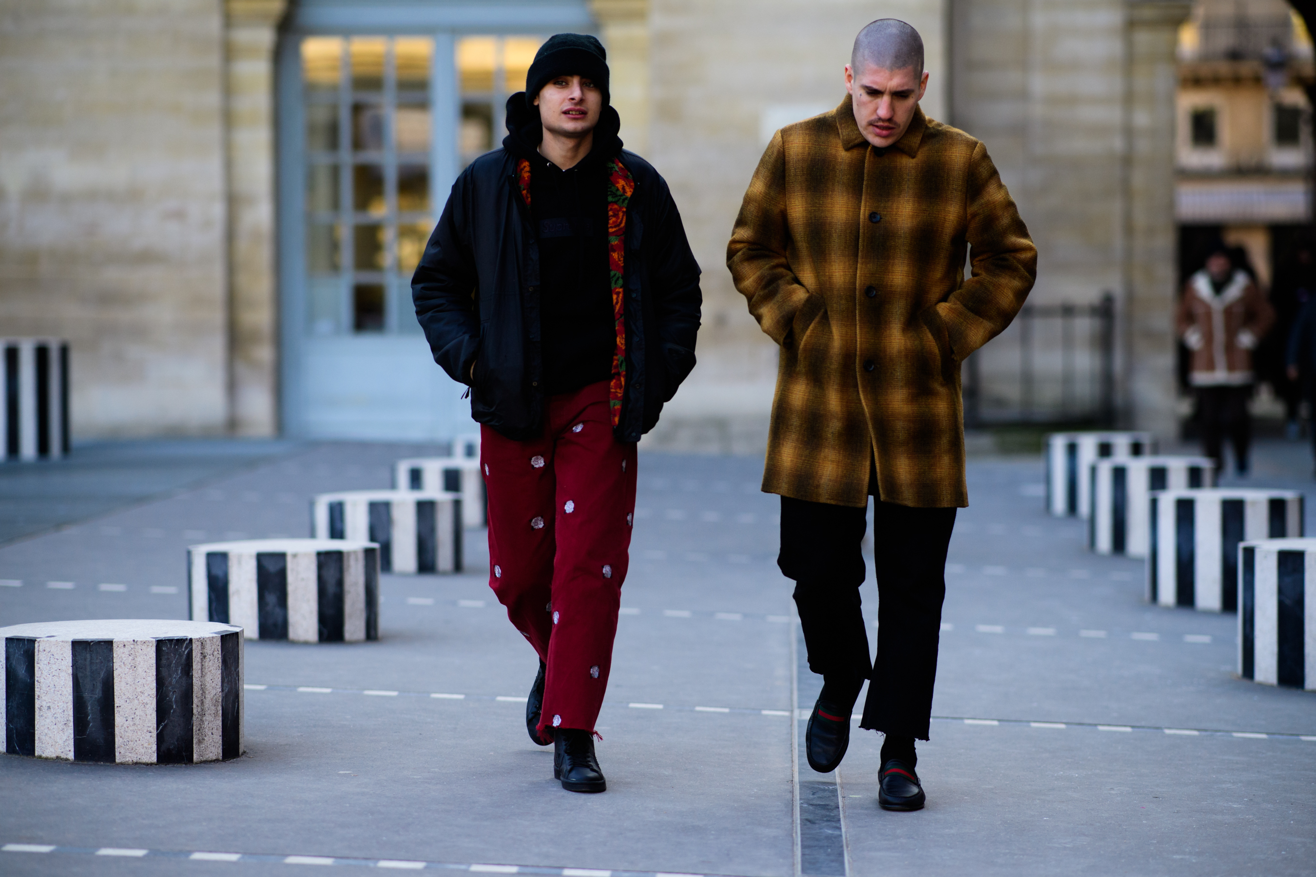 Men wearing supreme clothes