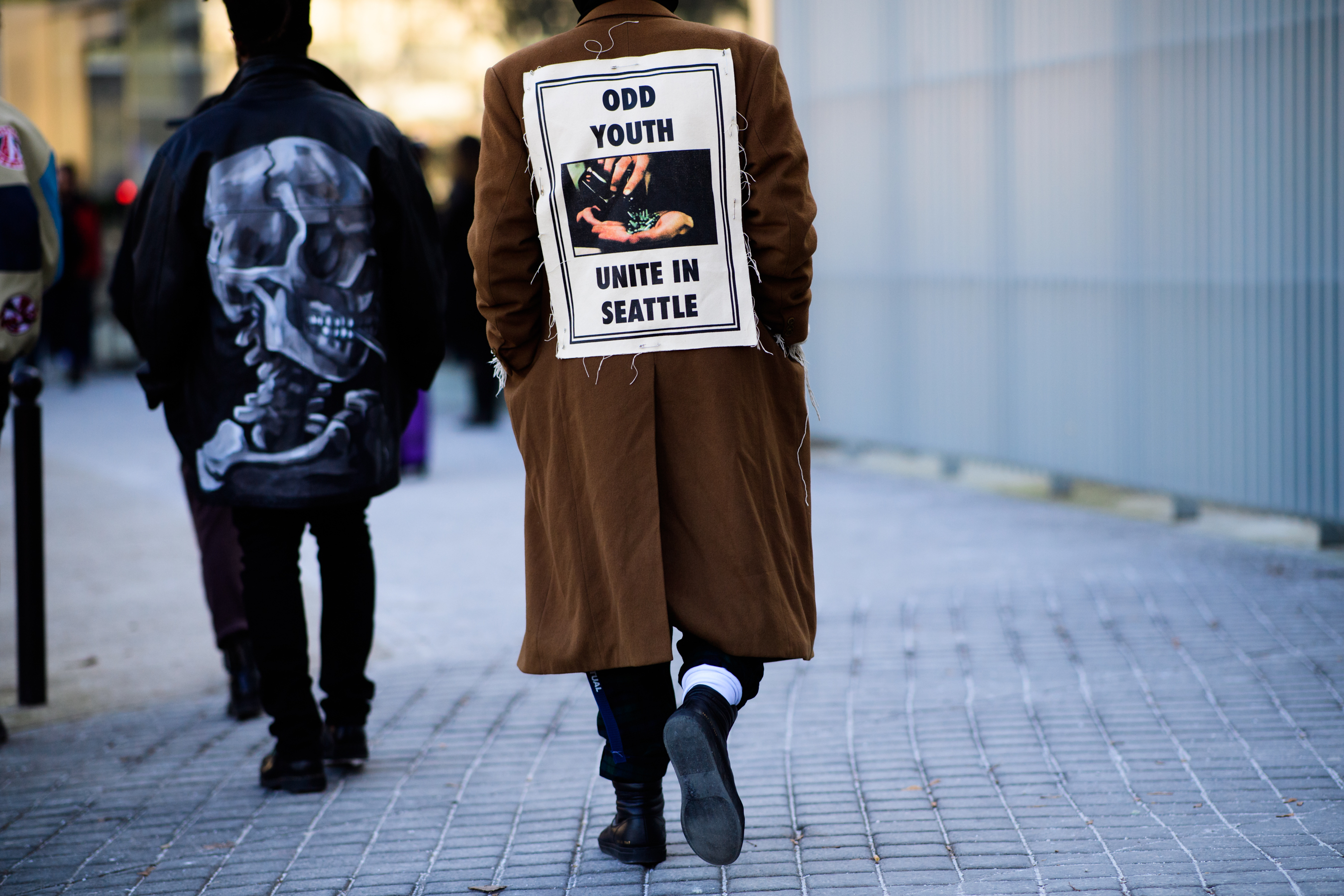Man wearing brown coat
