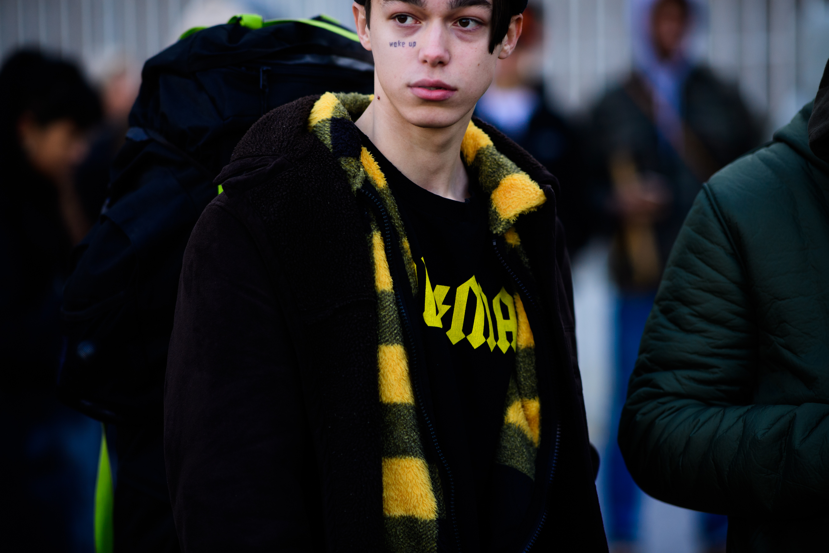 Man wearing black and yellow