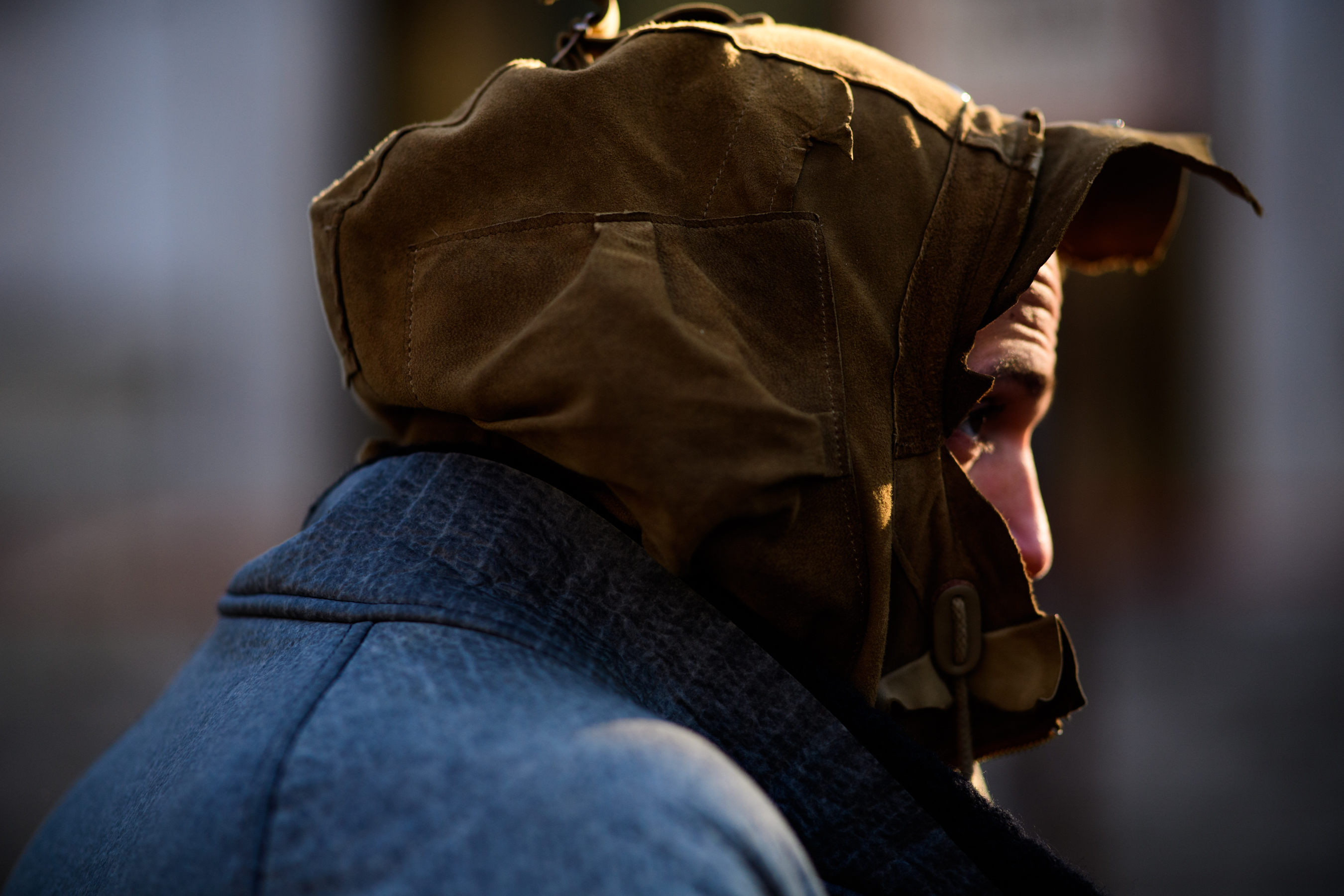 Man wearing brown cap
