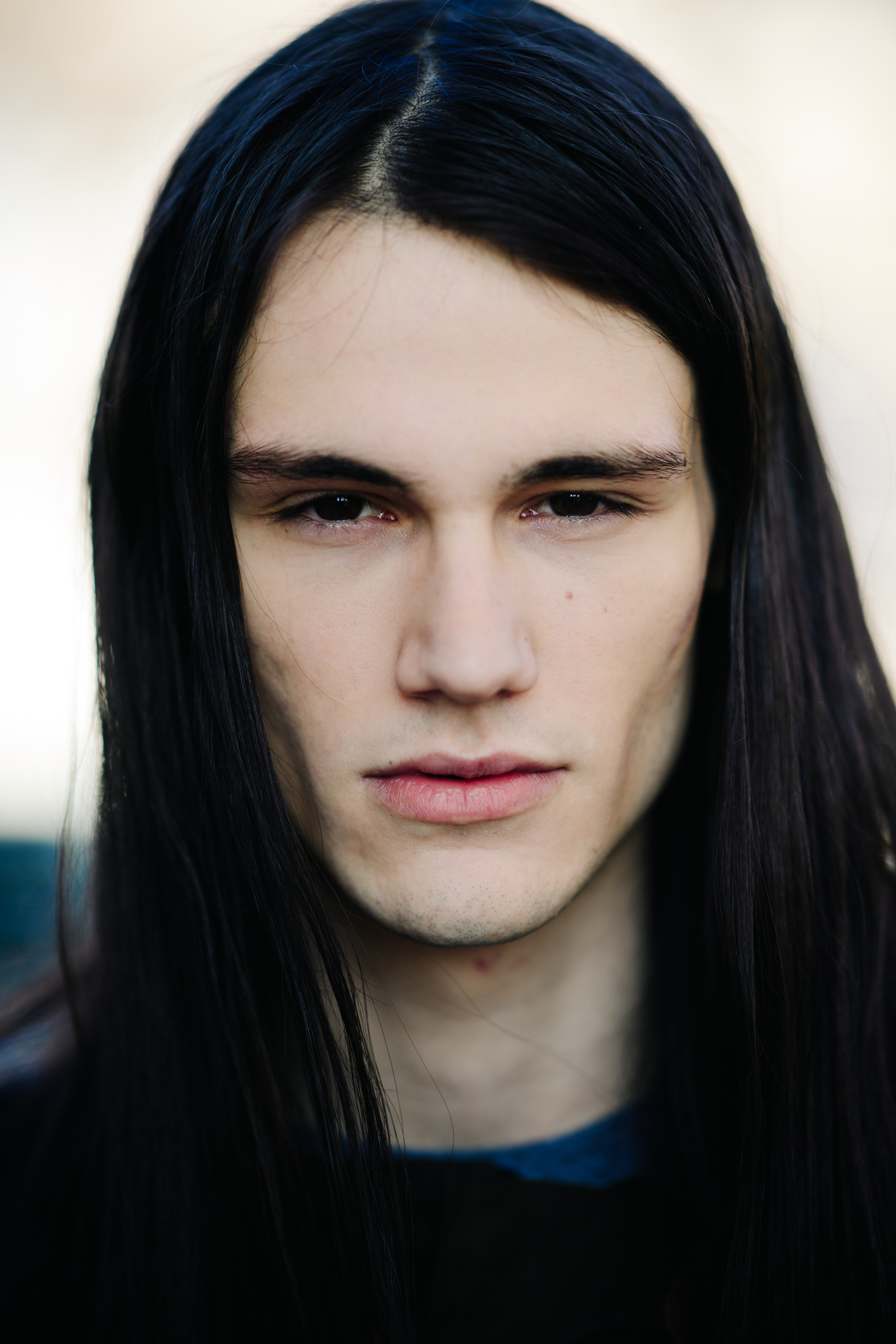 Portrait of male model with long hair