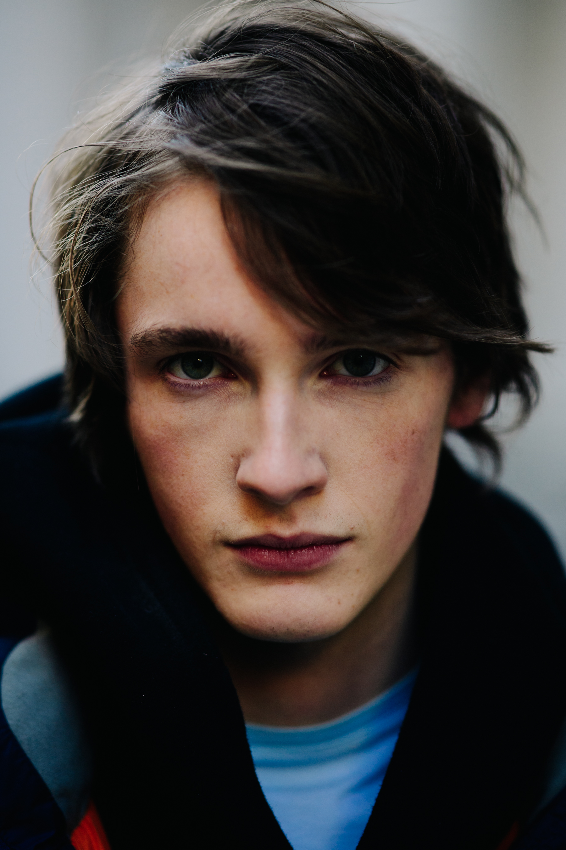 Portrait of male model with long hair