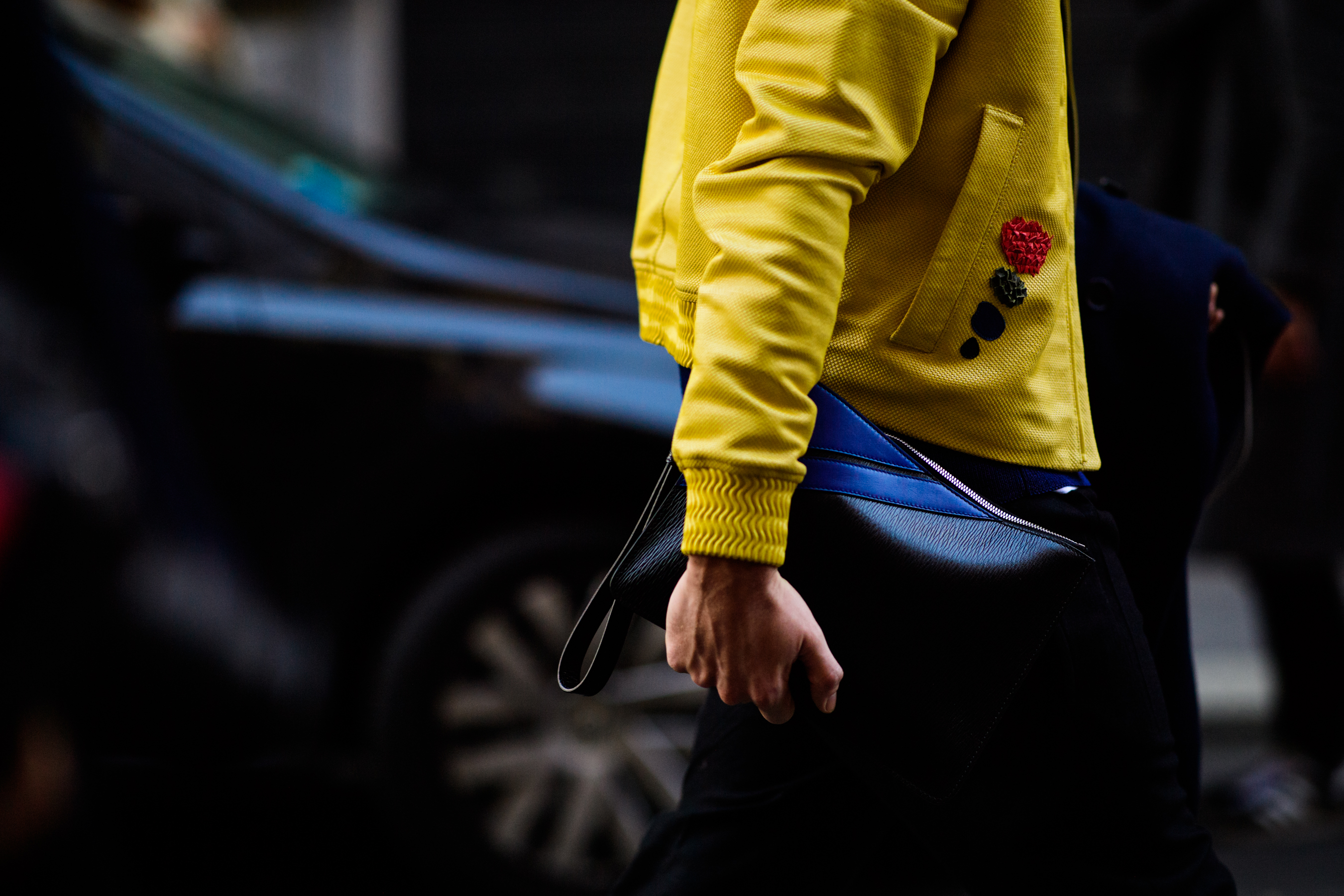 Man wearing yellow jacket