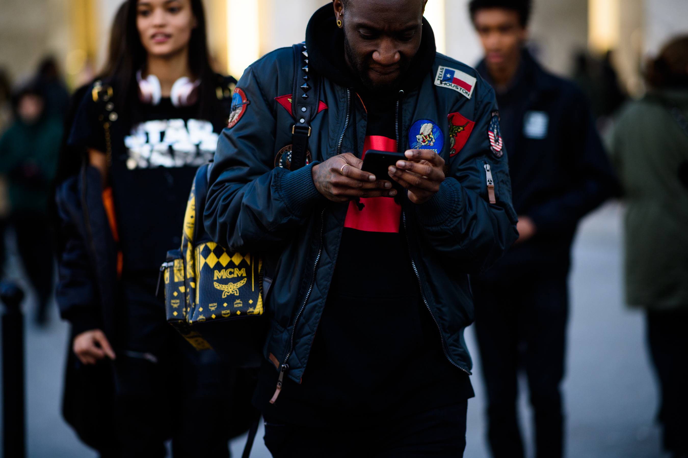 Man wearing green bomber