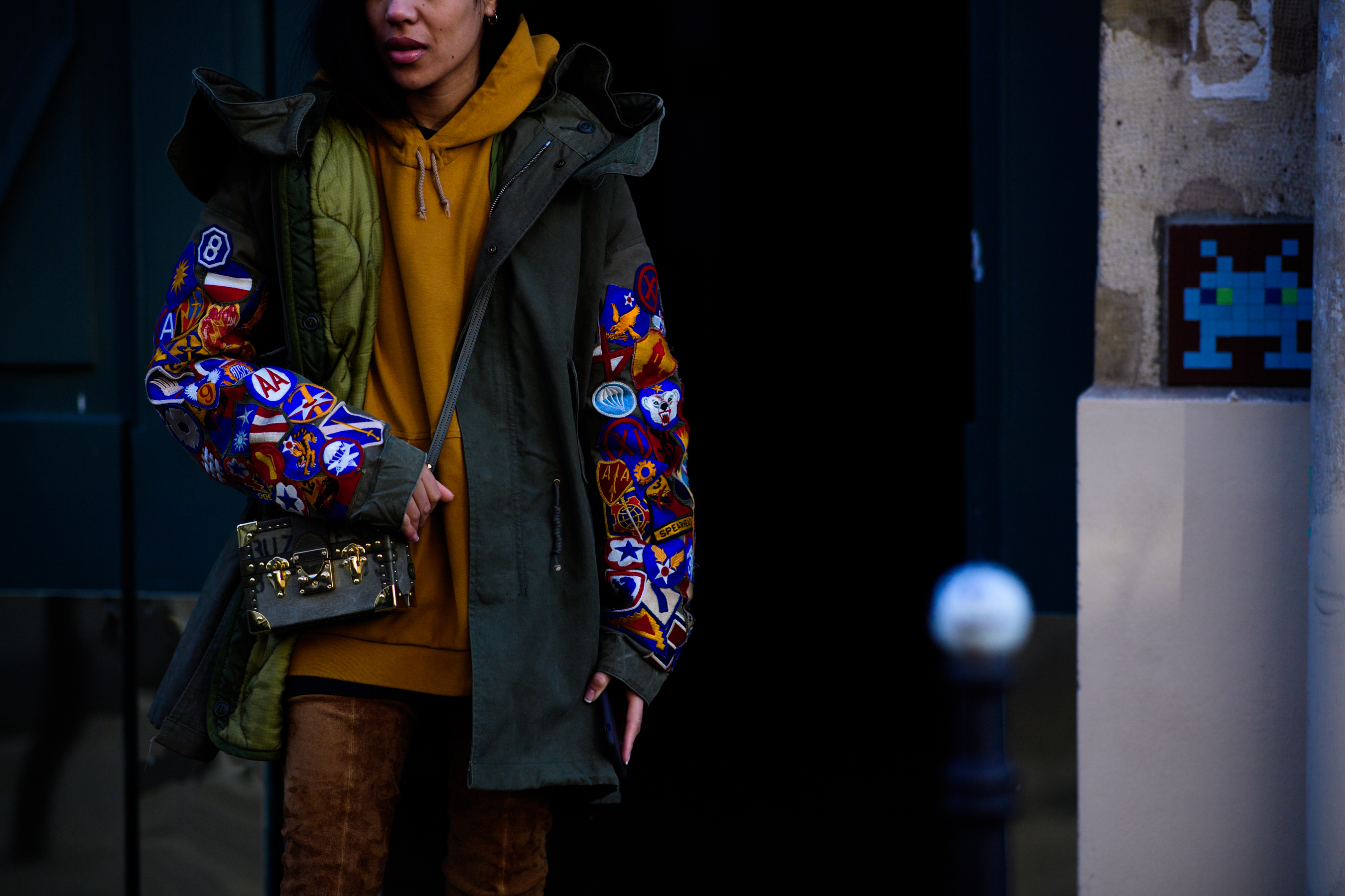 Woman wearing Louis Vuitton handbag