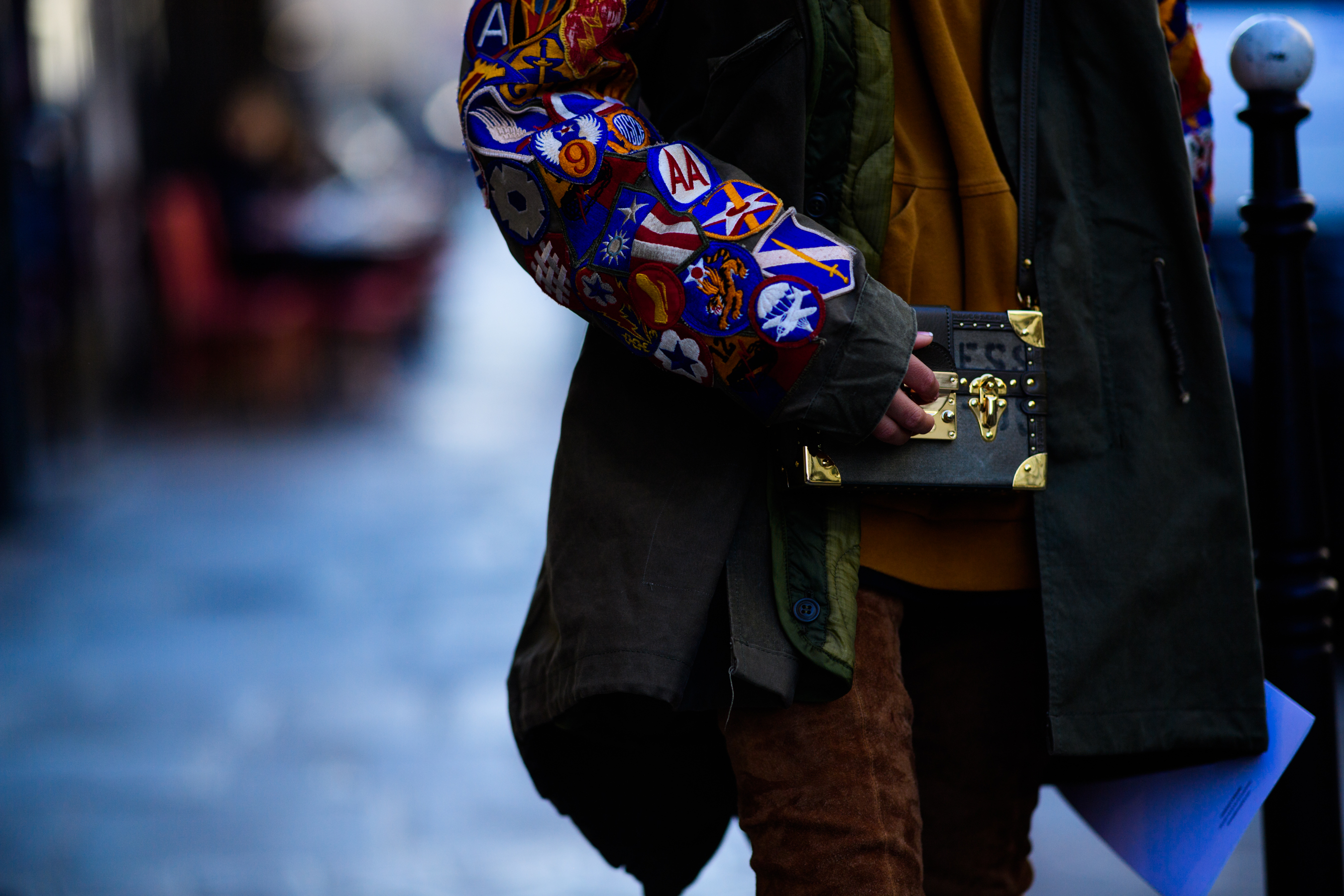 Woman wearing Louis Vuitton handbag