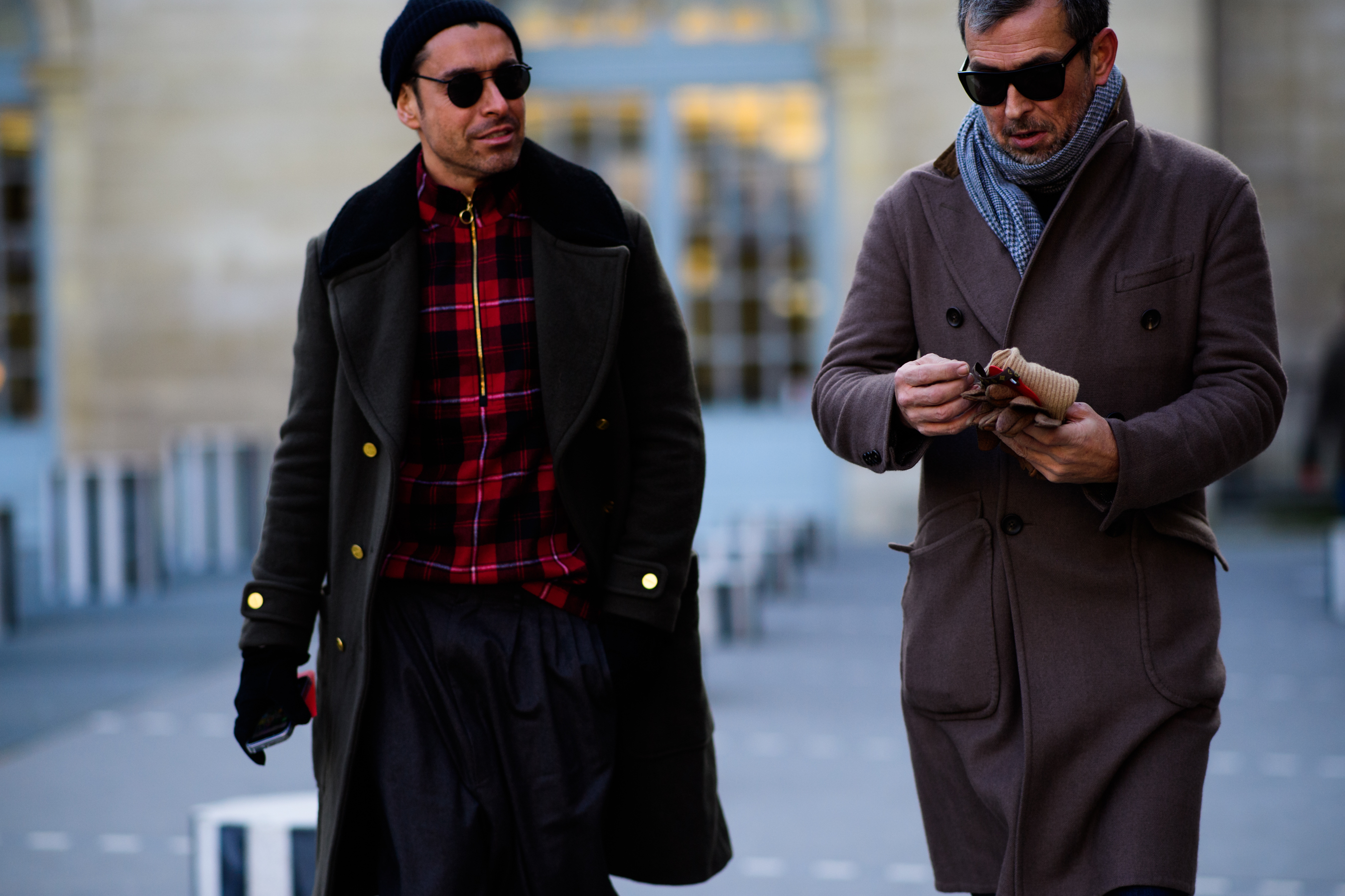 Two mature men wearing coat