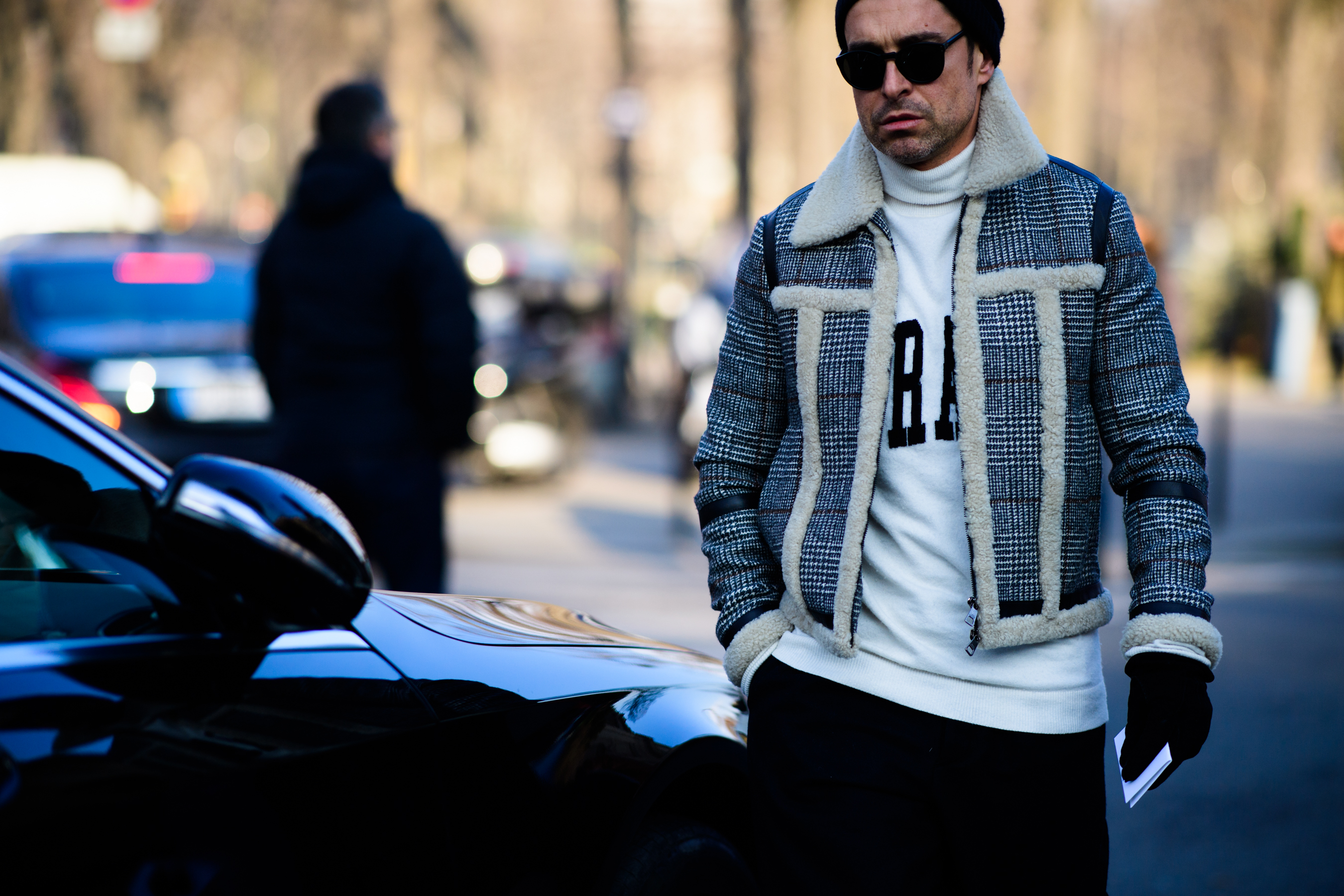 Man wearing white sweater
