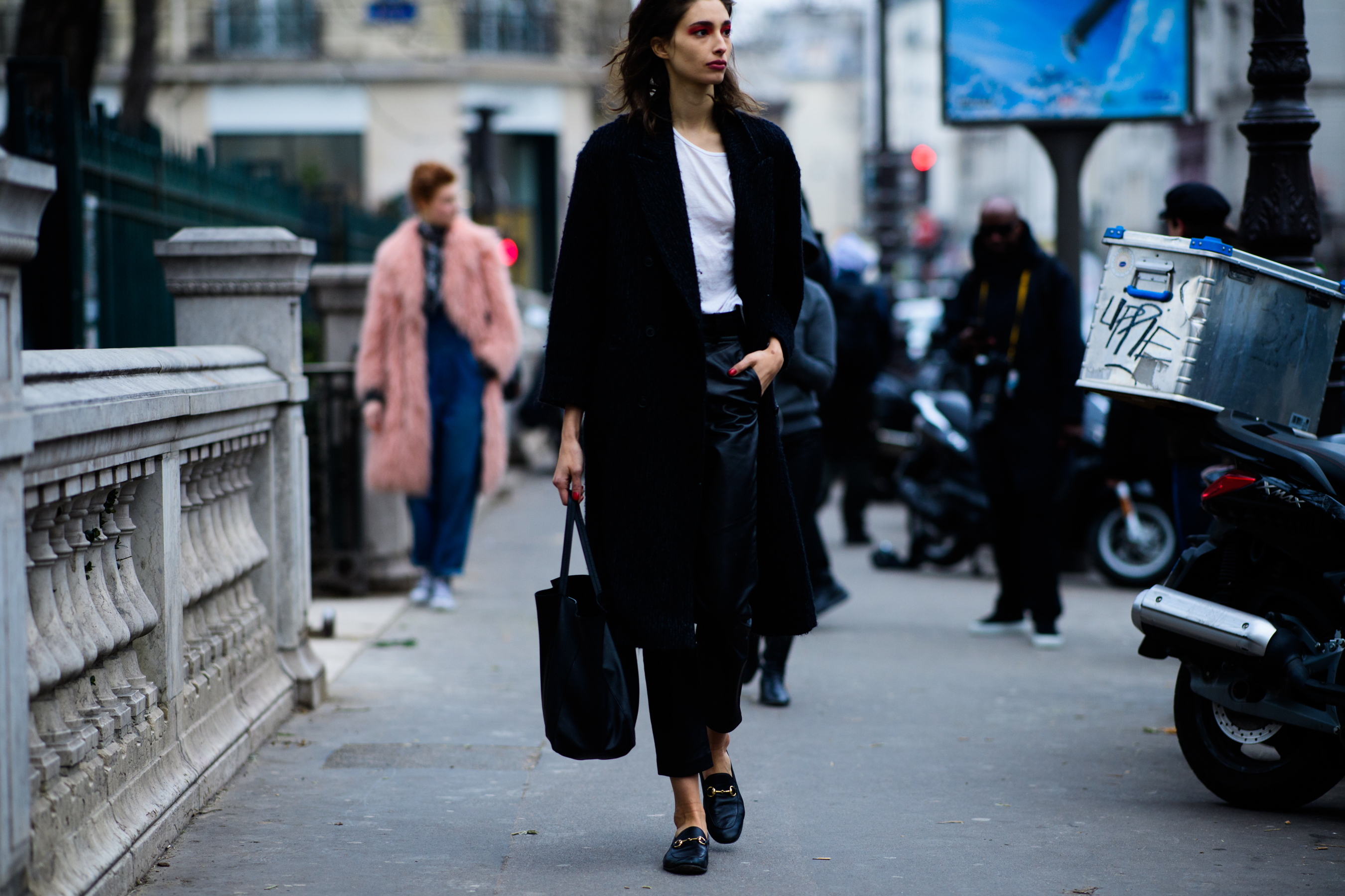 Woman wearing Gucci shoes