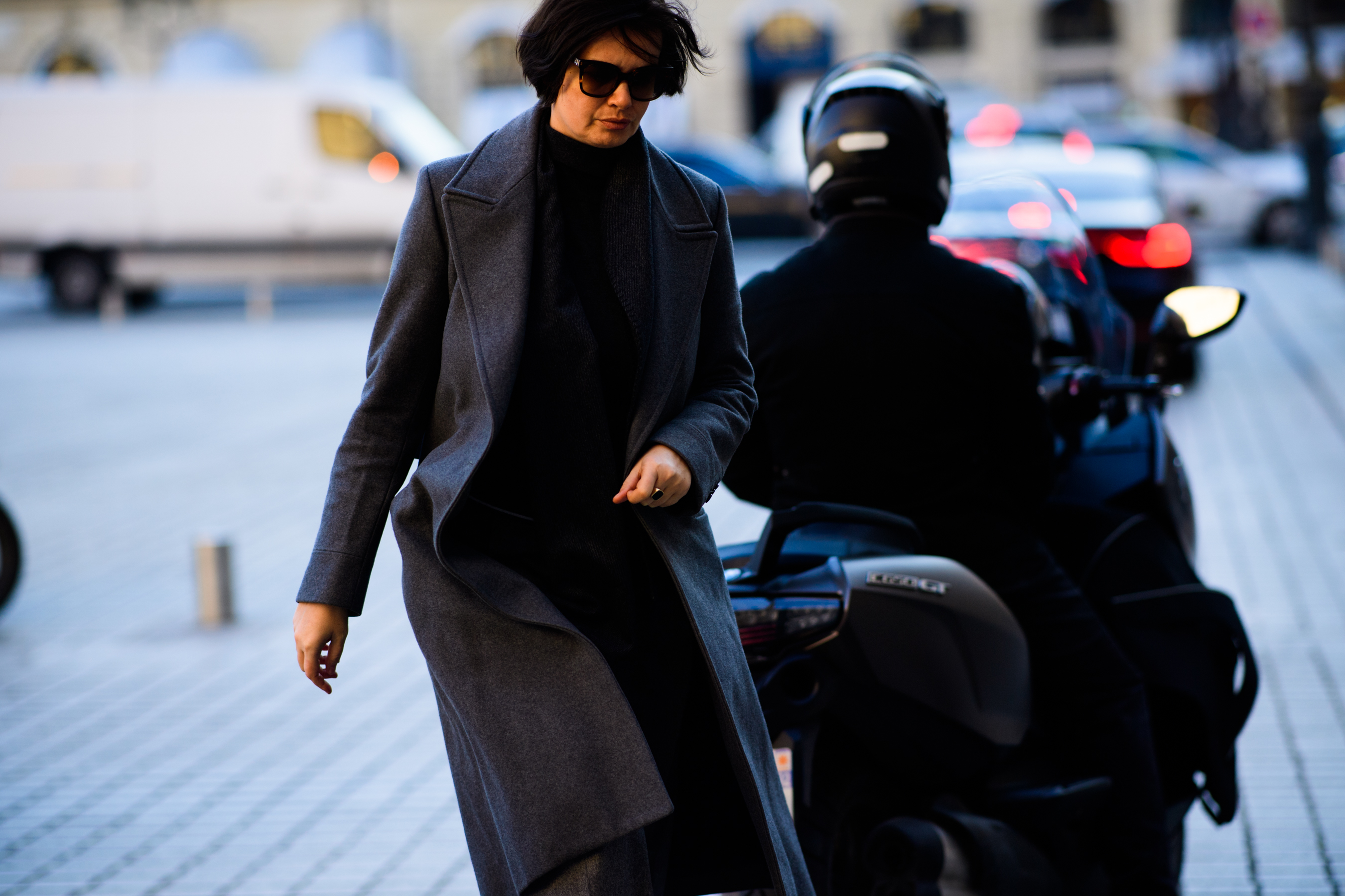 Woman wearing grey coat