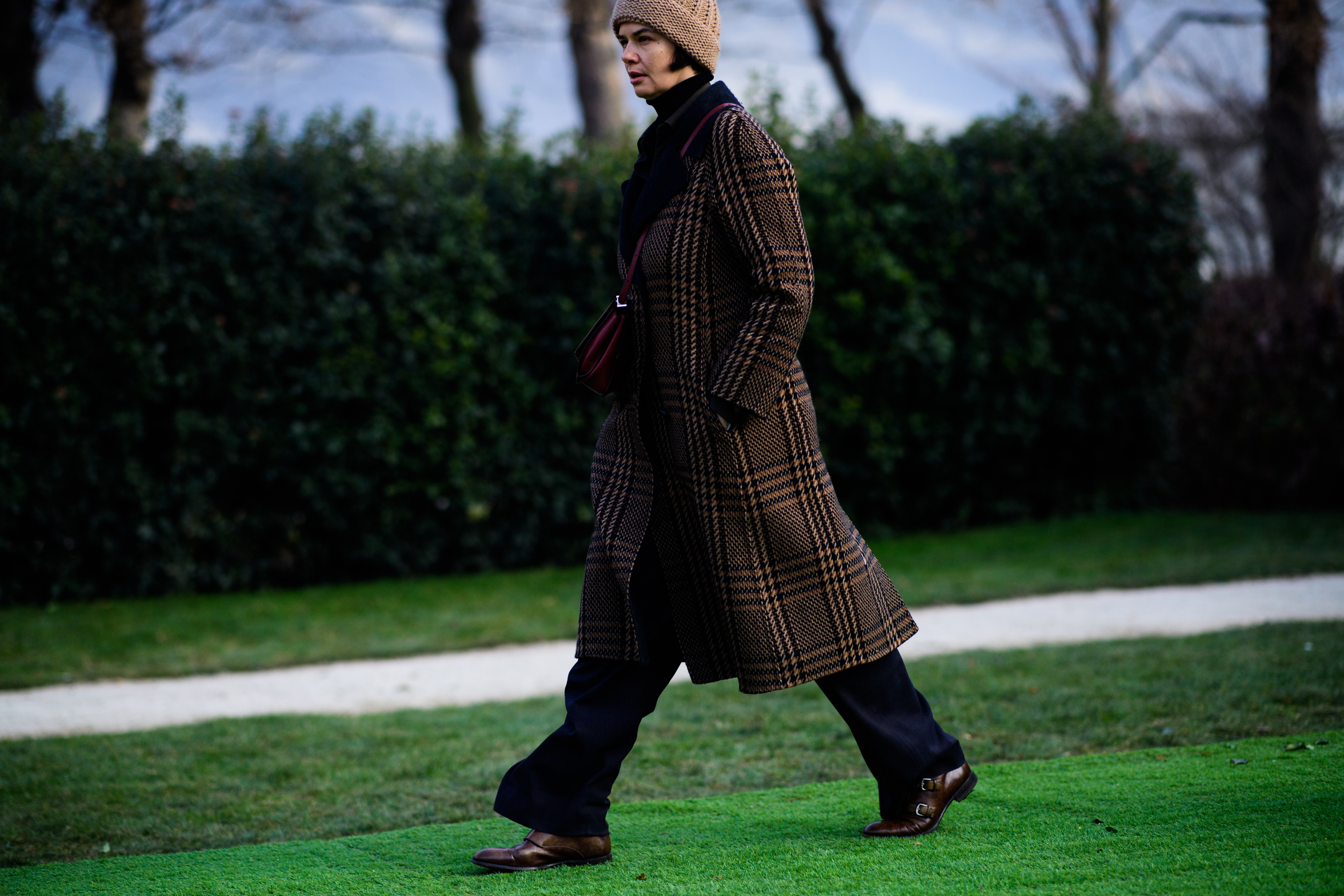 Woman wearing brown coat