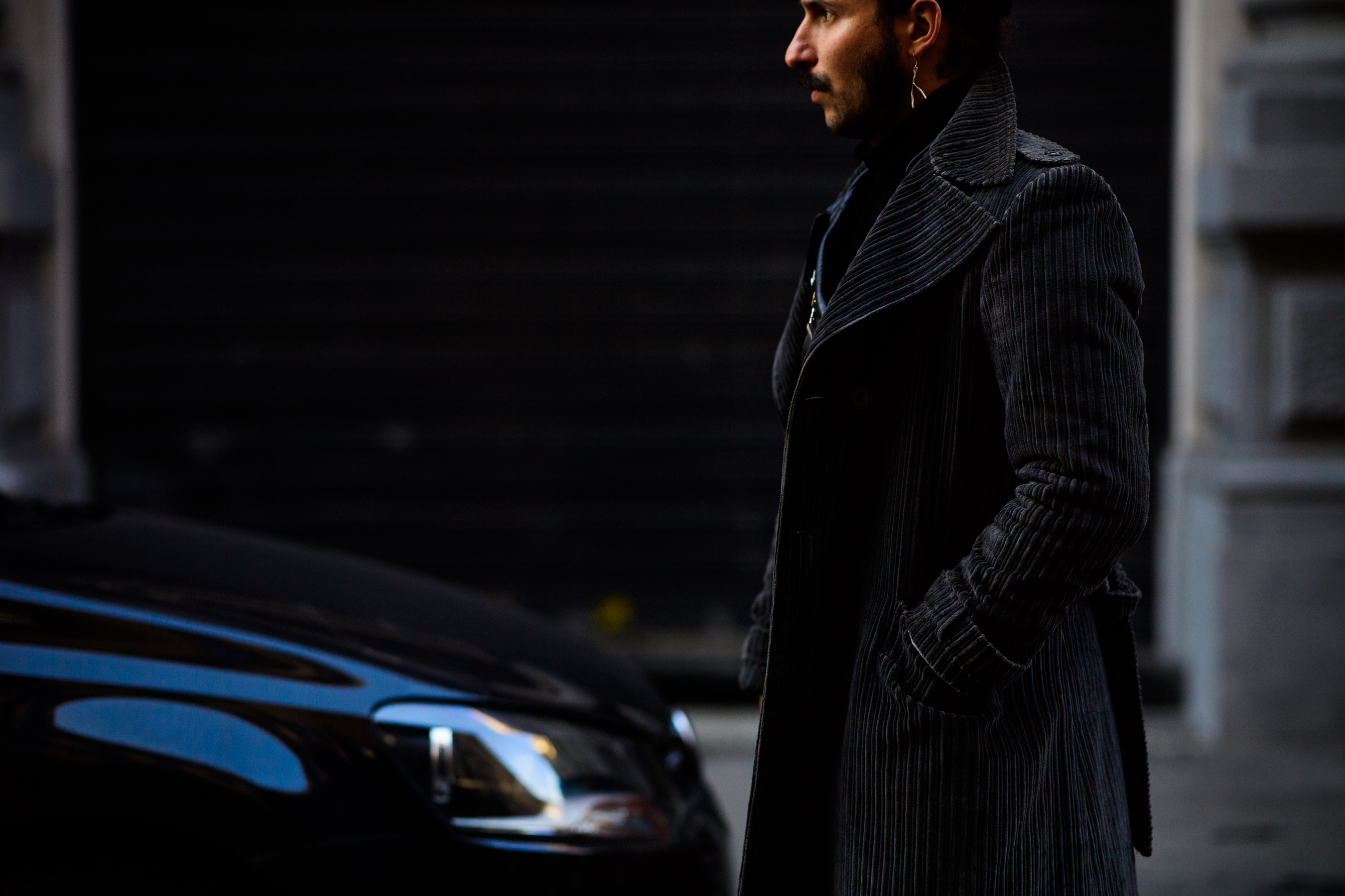 Designer wearing coat