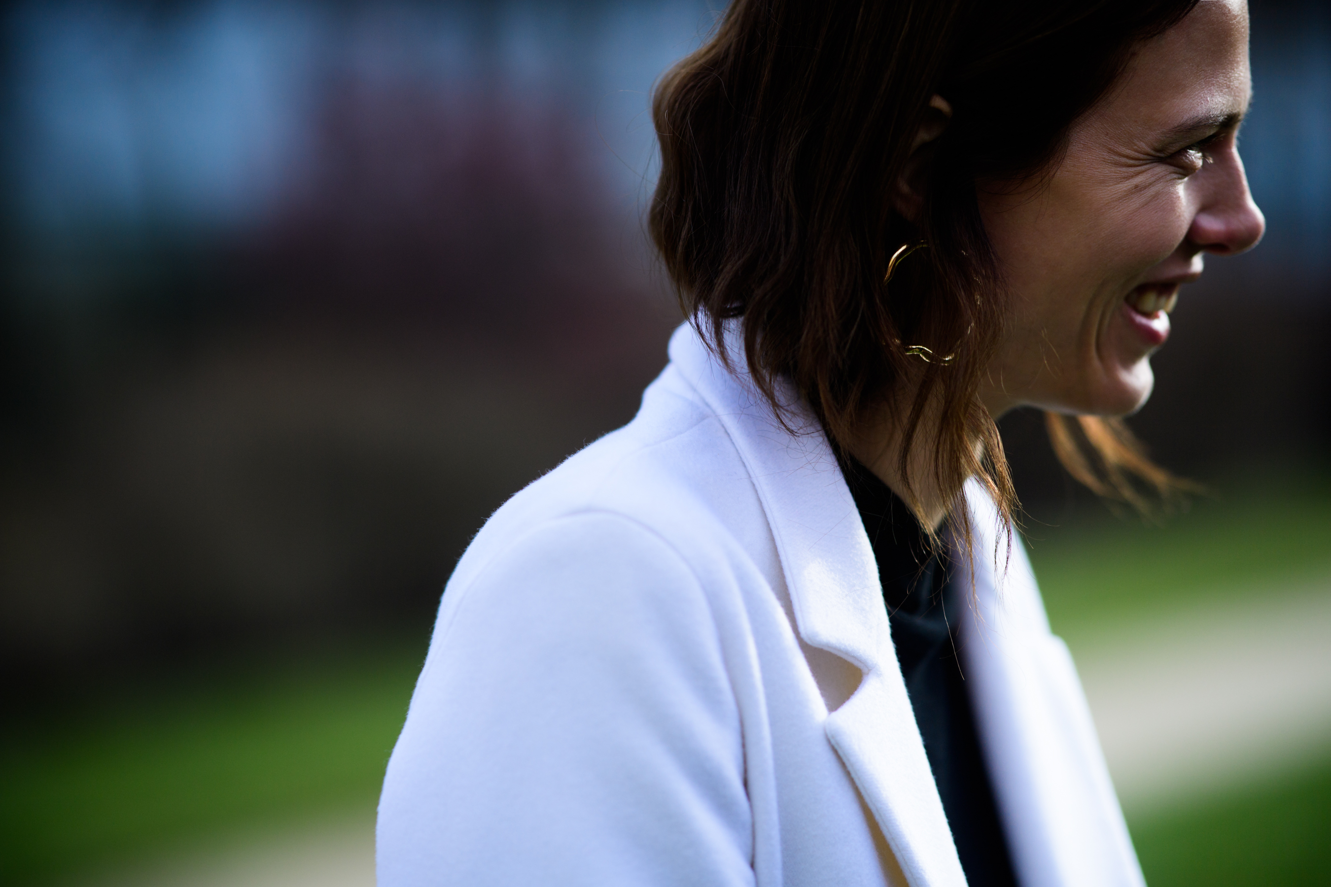 Woman wearing white coat