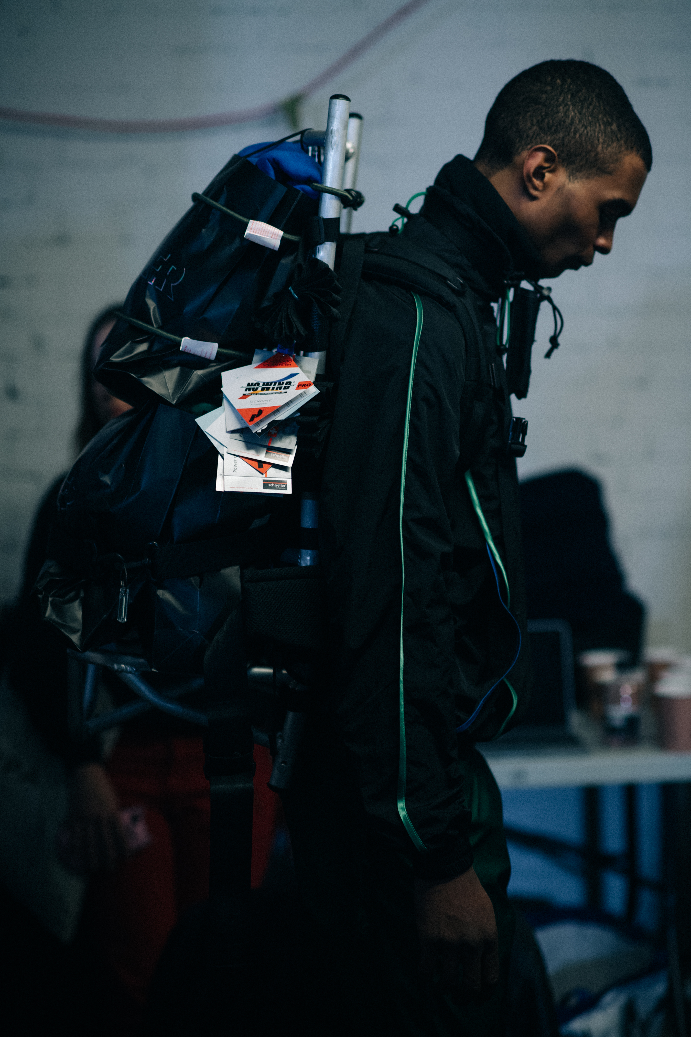 Ainsley wearing backpack for the show