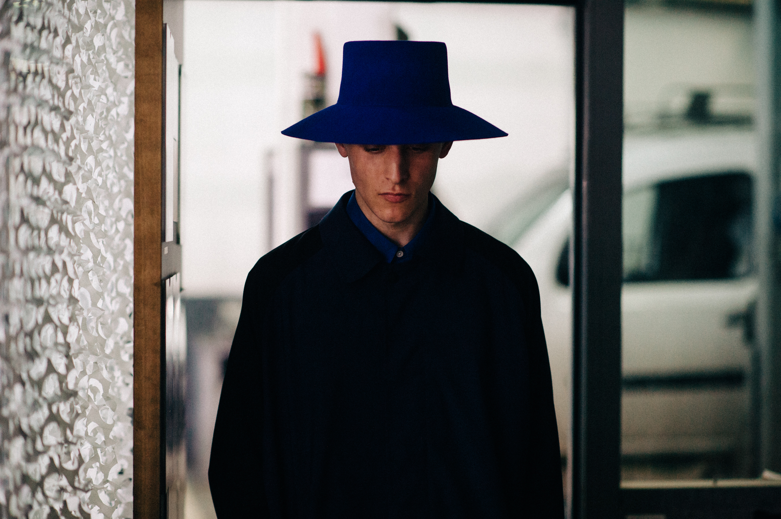 Male model wearing blue hat