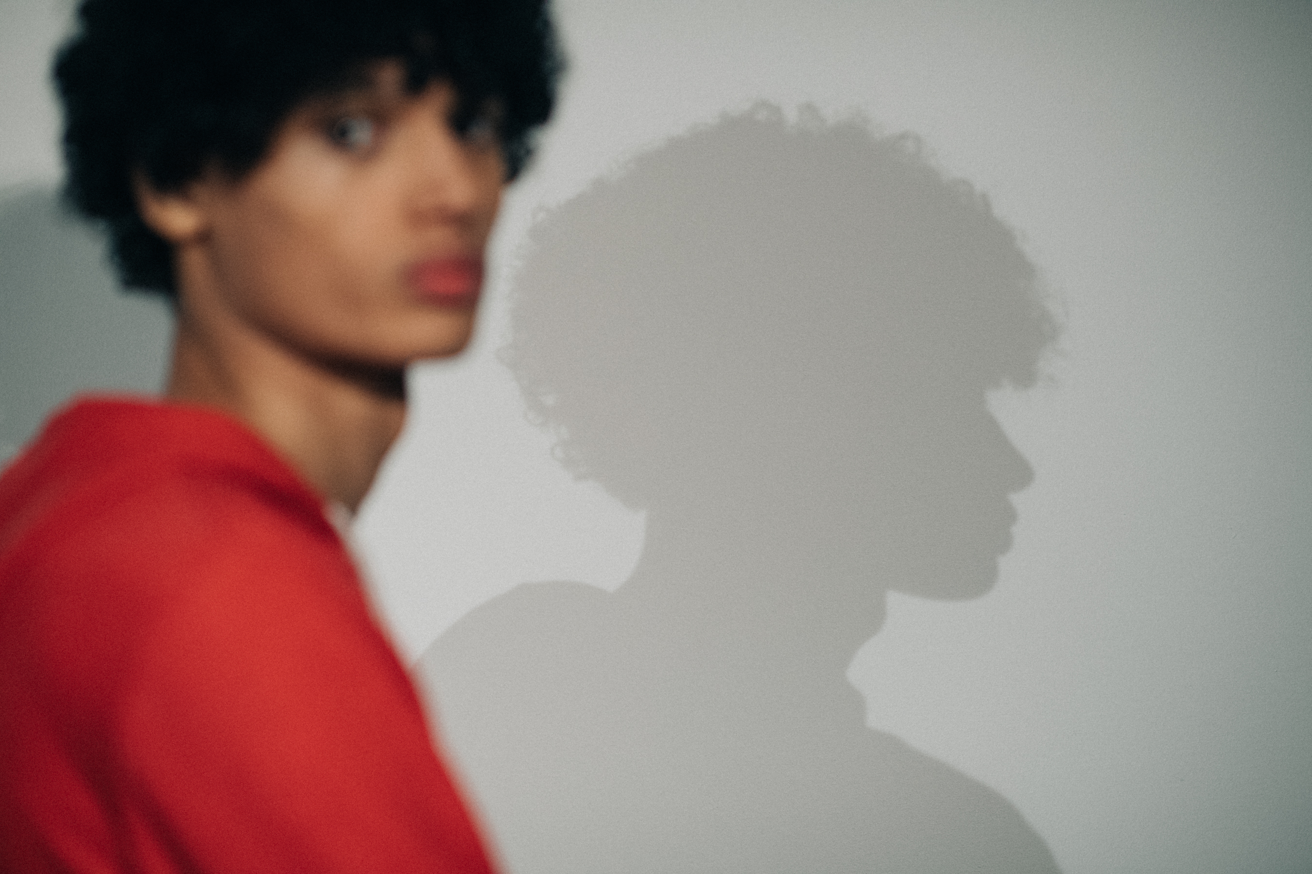 Malik Jalloh wearing red sweater