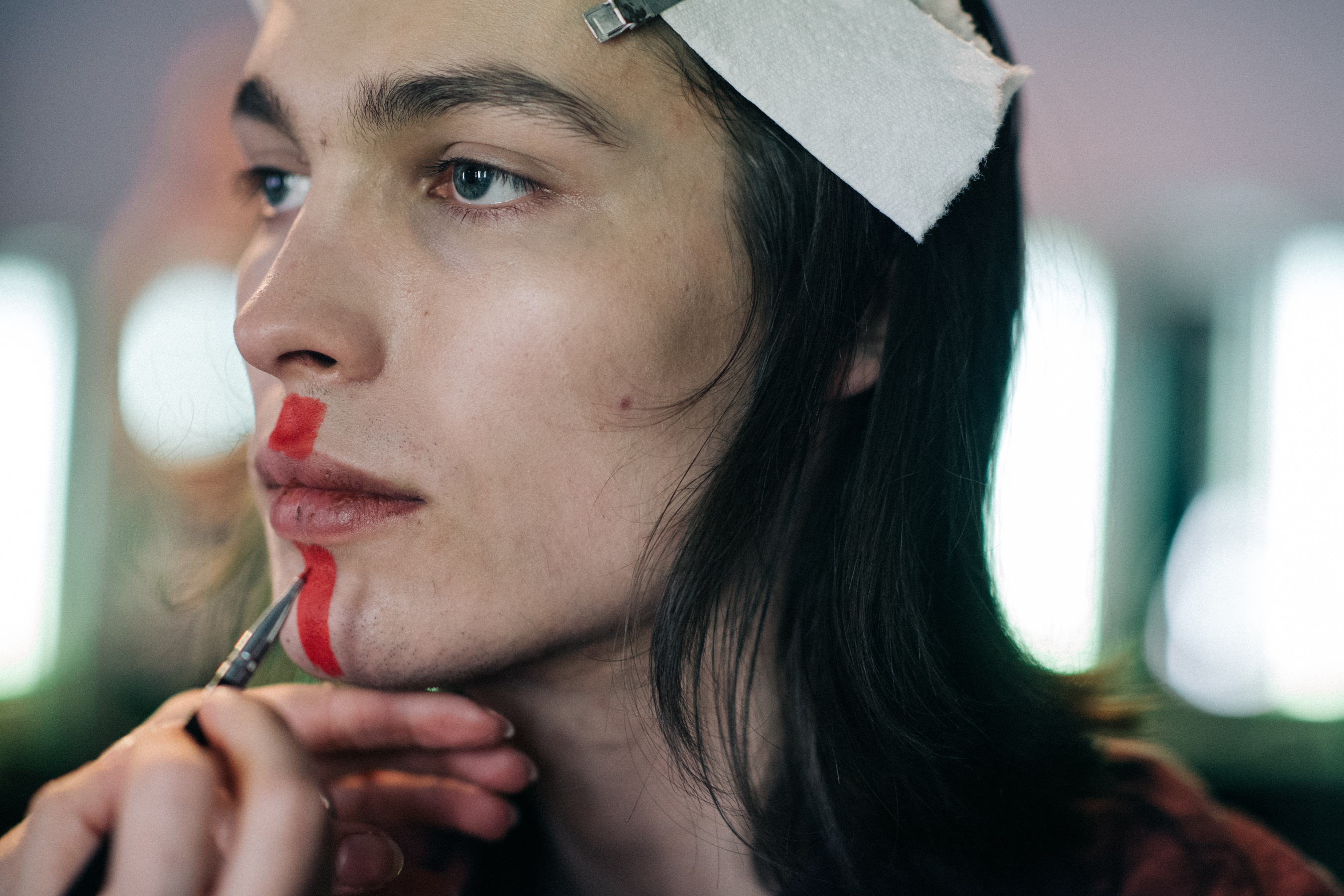 Male model wearing makeup