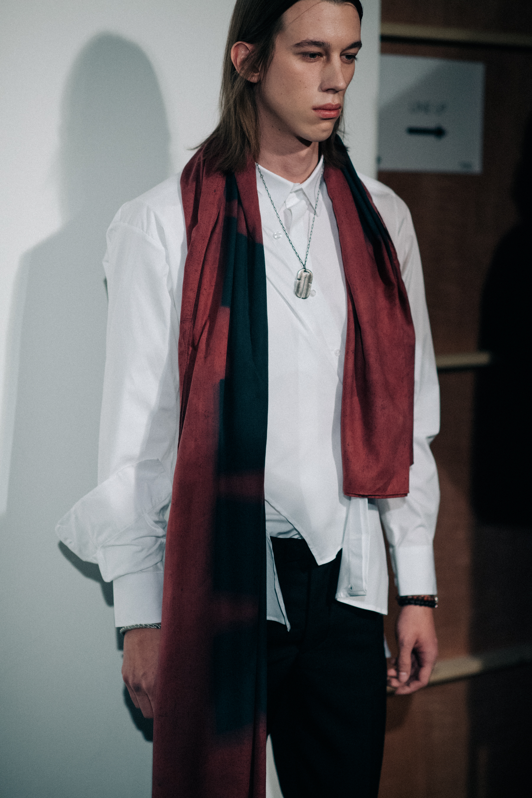 Armand Puszta wearing shirt with scarf