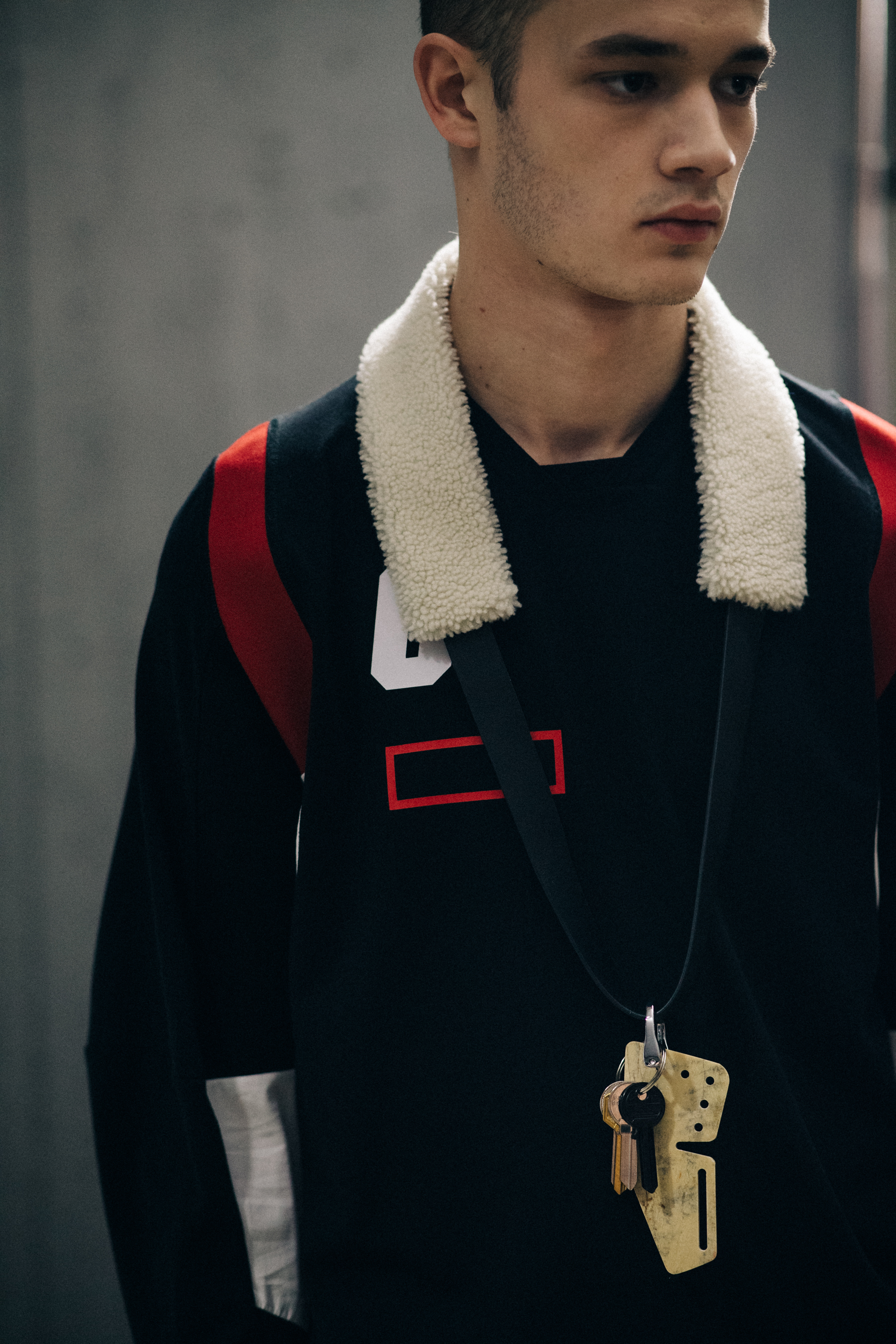 Maxime Frenel wearing necklace