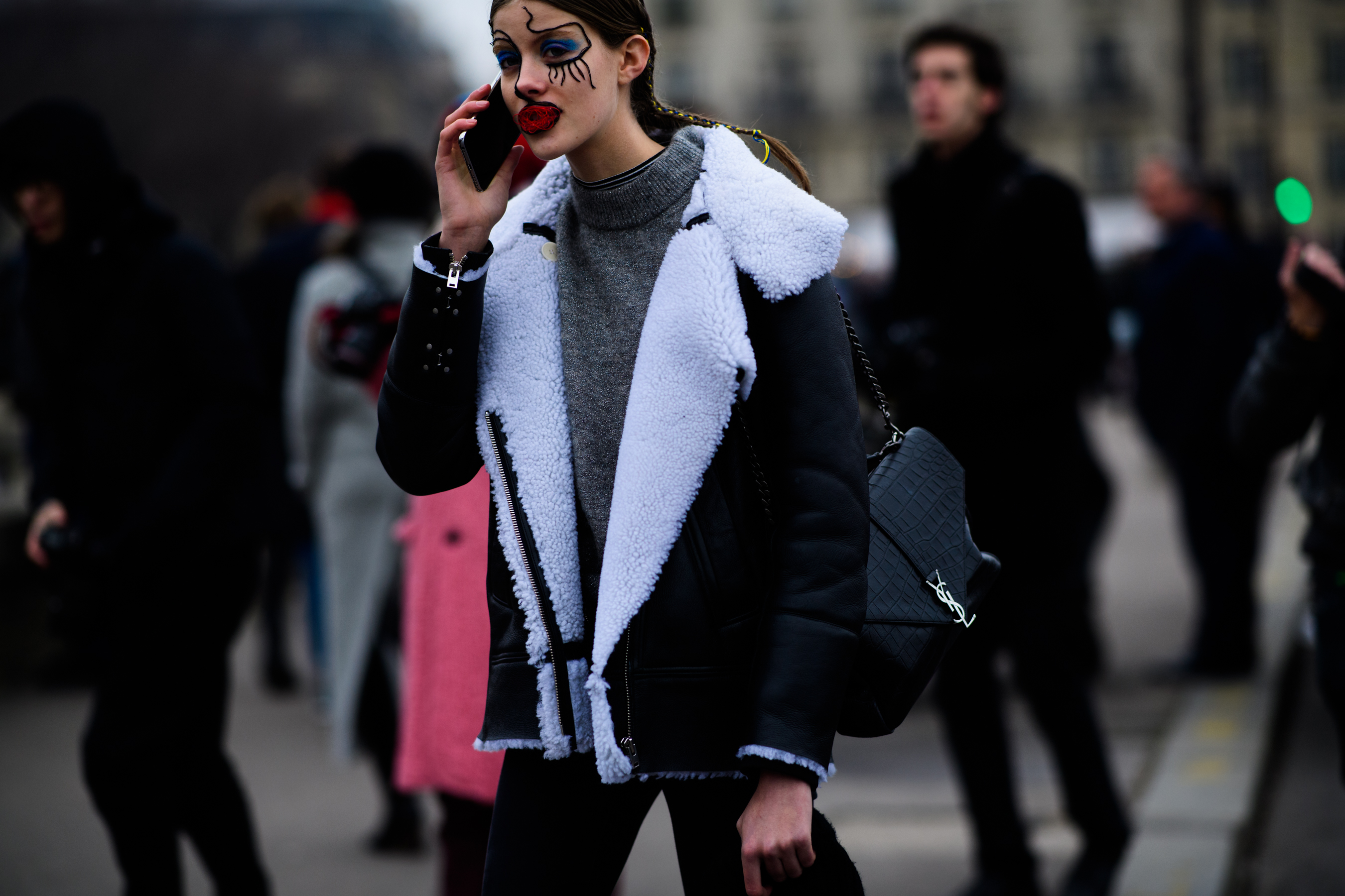 Model wearing YSL handbag