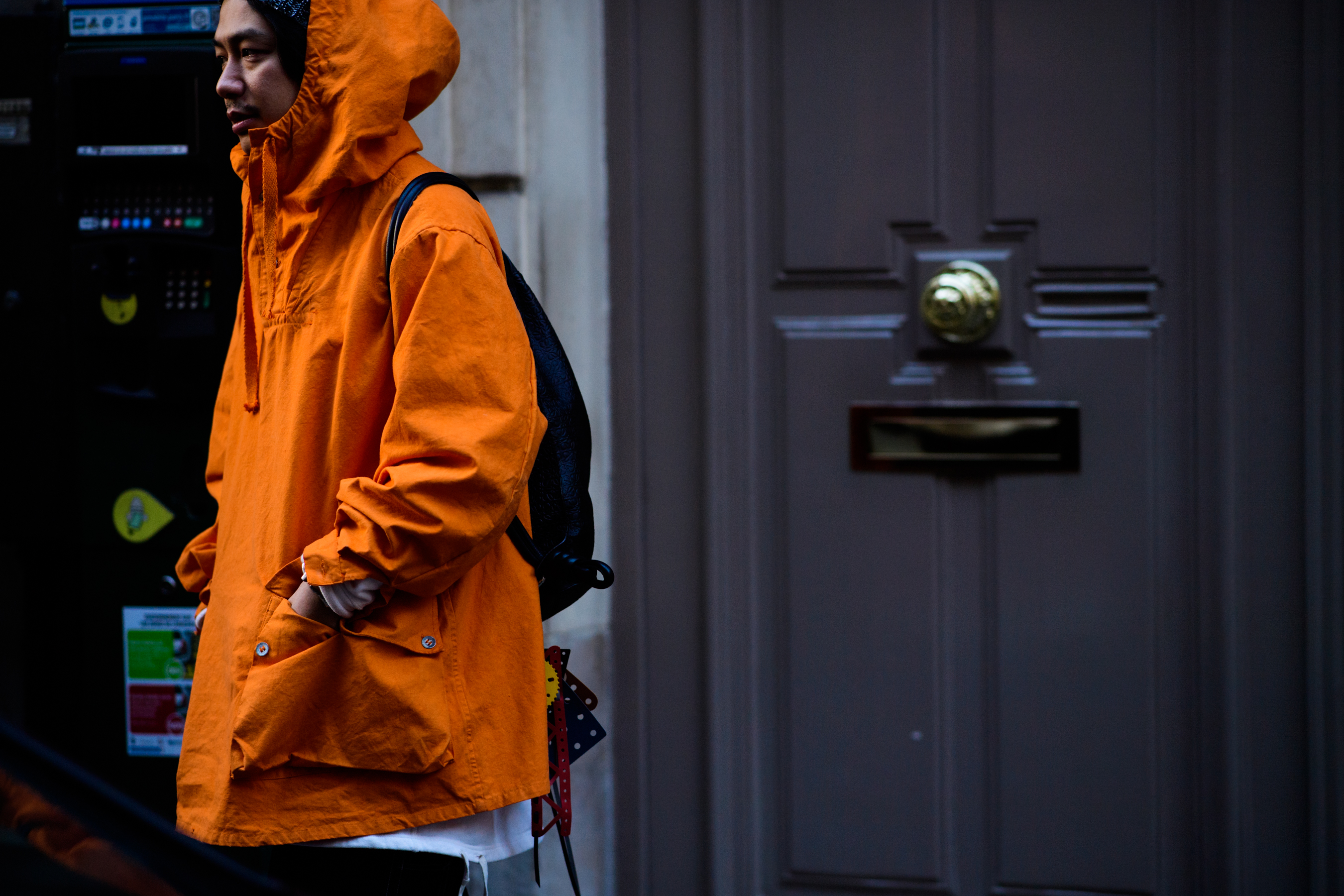 Man wearing orange clothes