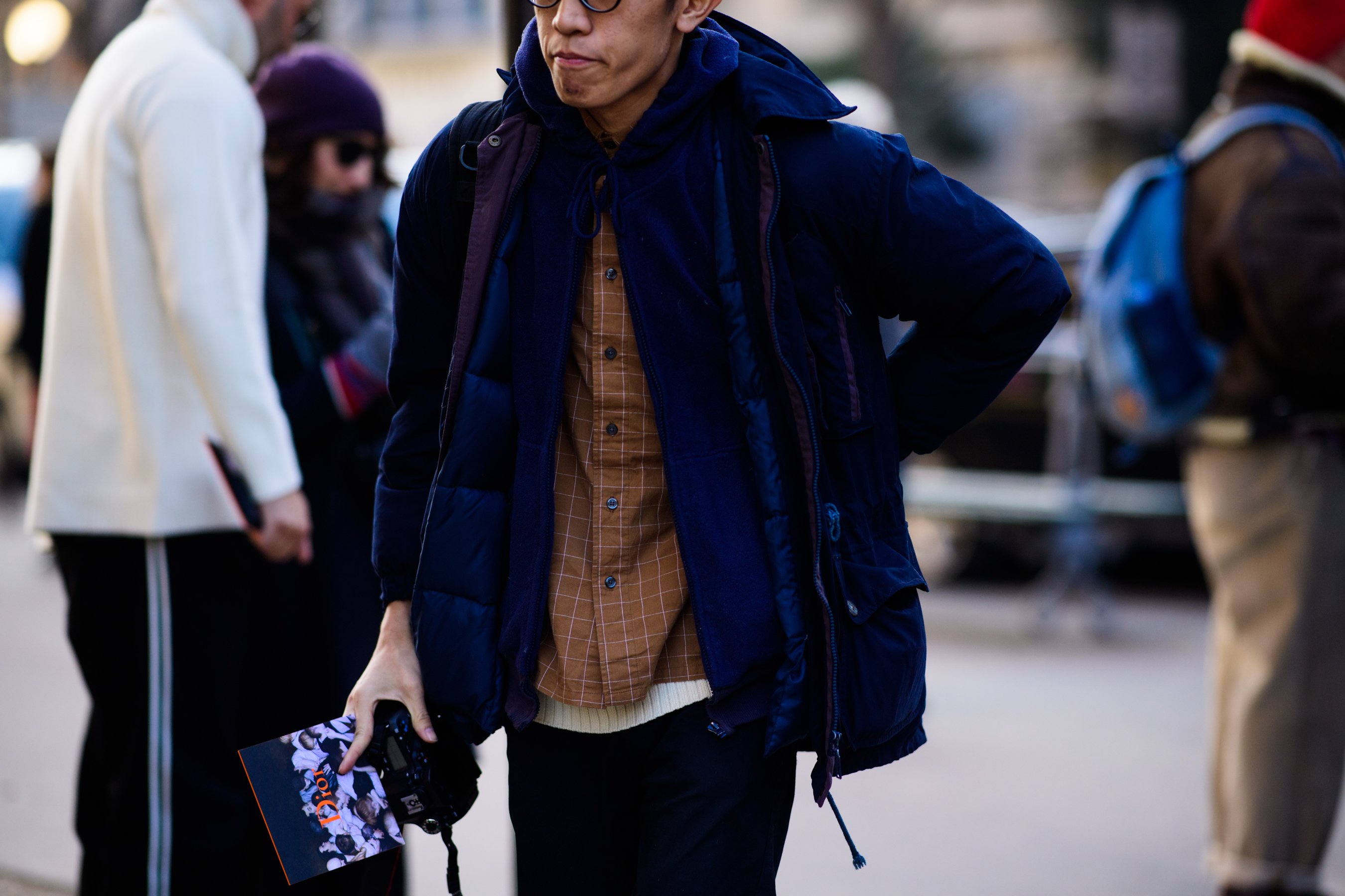 Photographer wearing blue jacket
