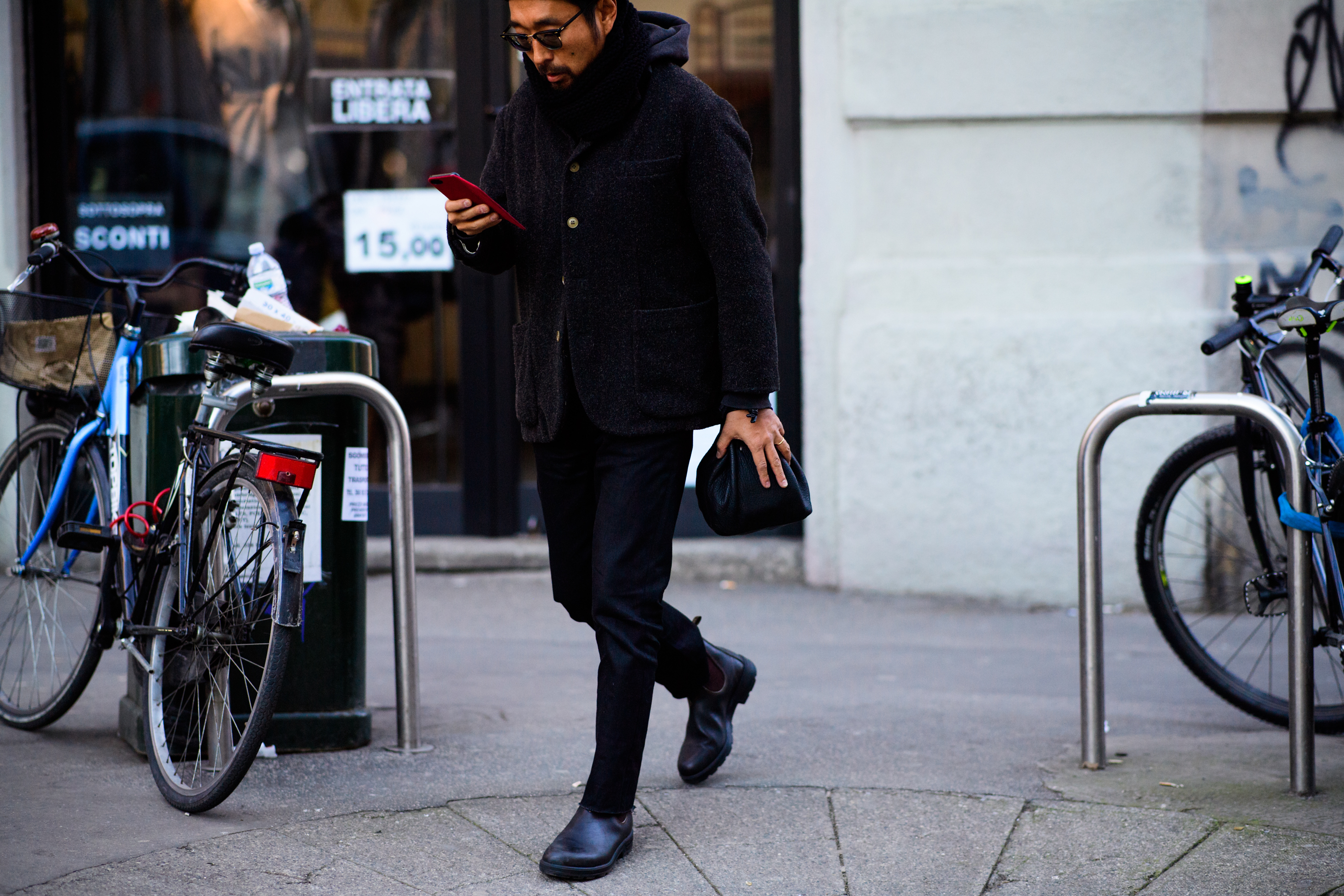 Asian man wearing all black