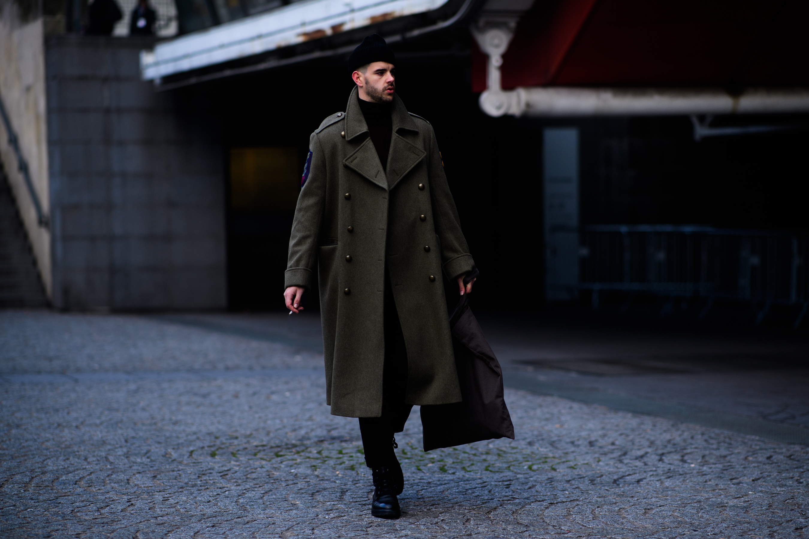Man wearing green coat