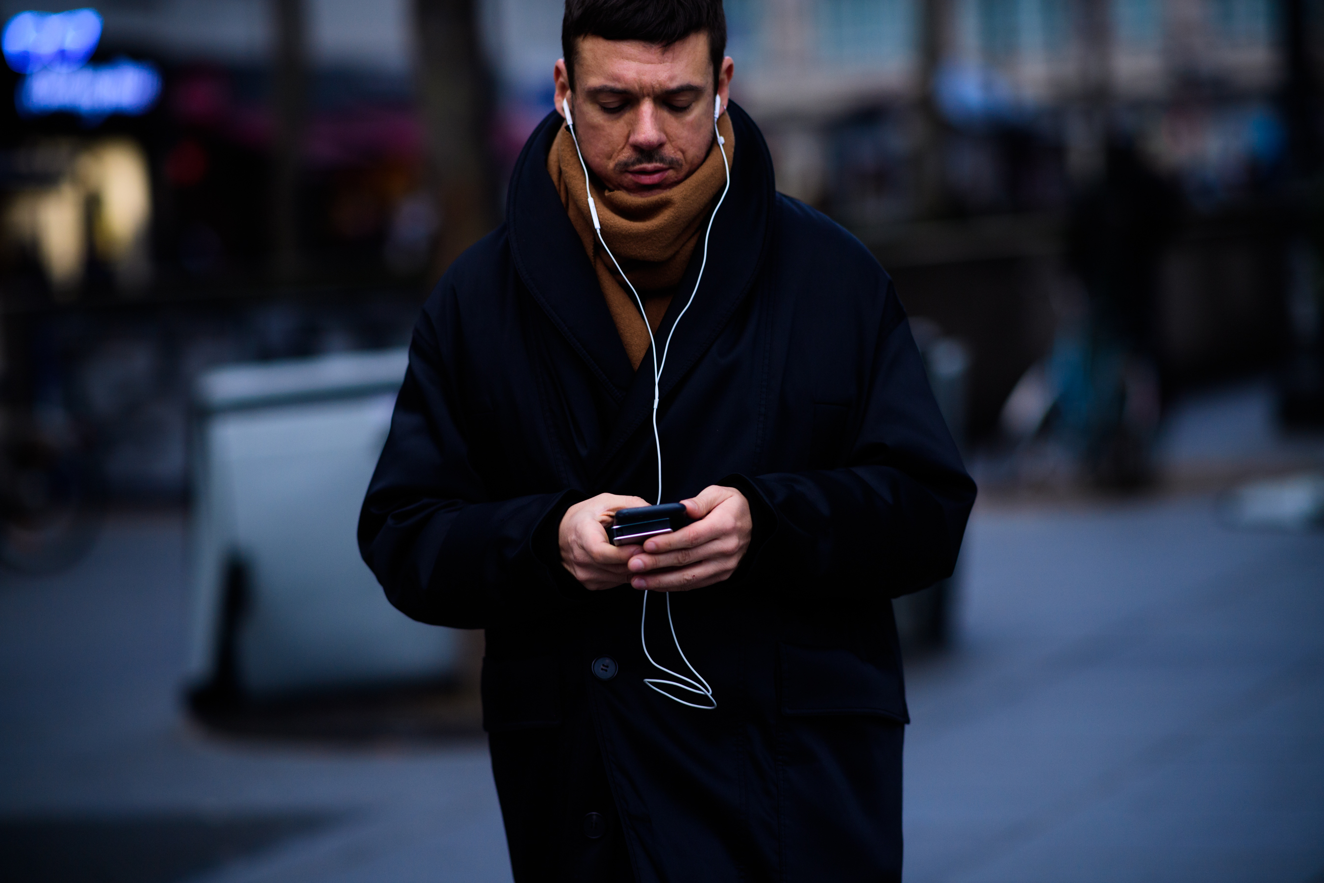 Man wearing brown scarf