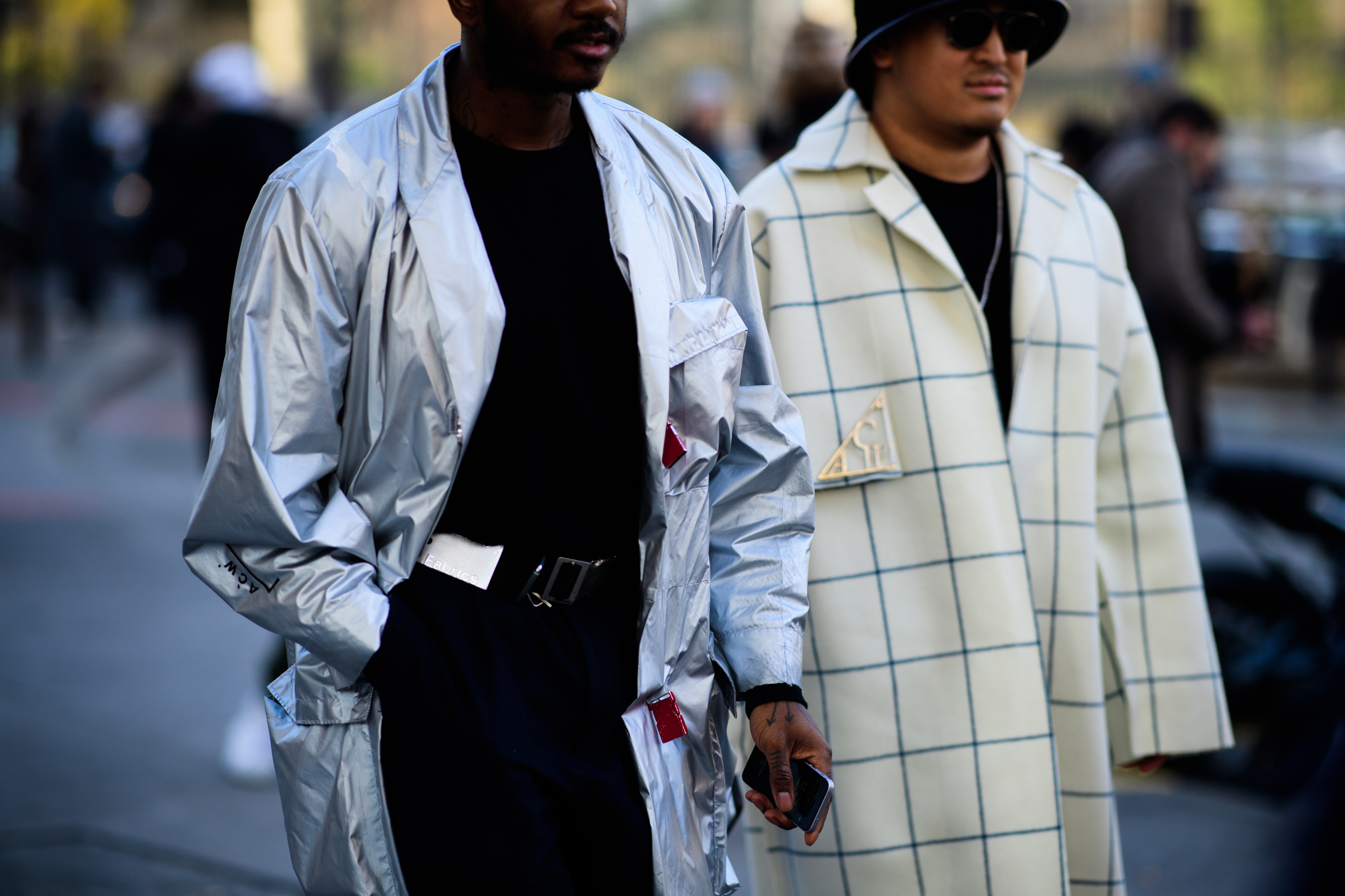 Man wearing metallic color cloak