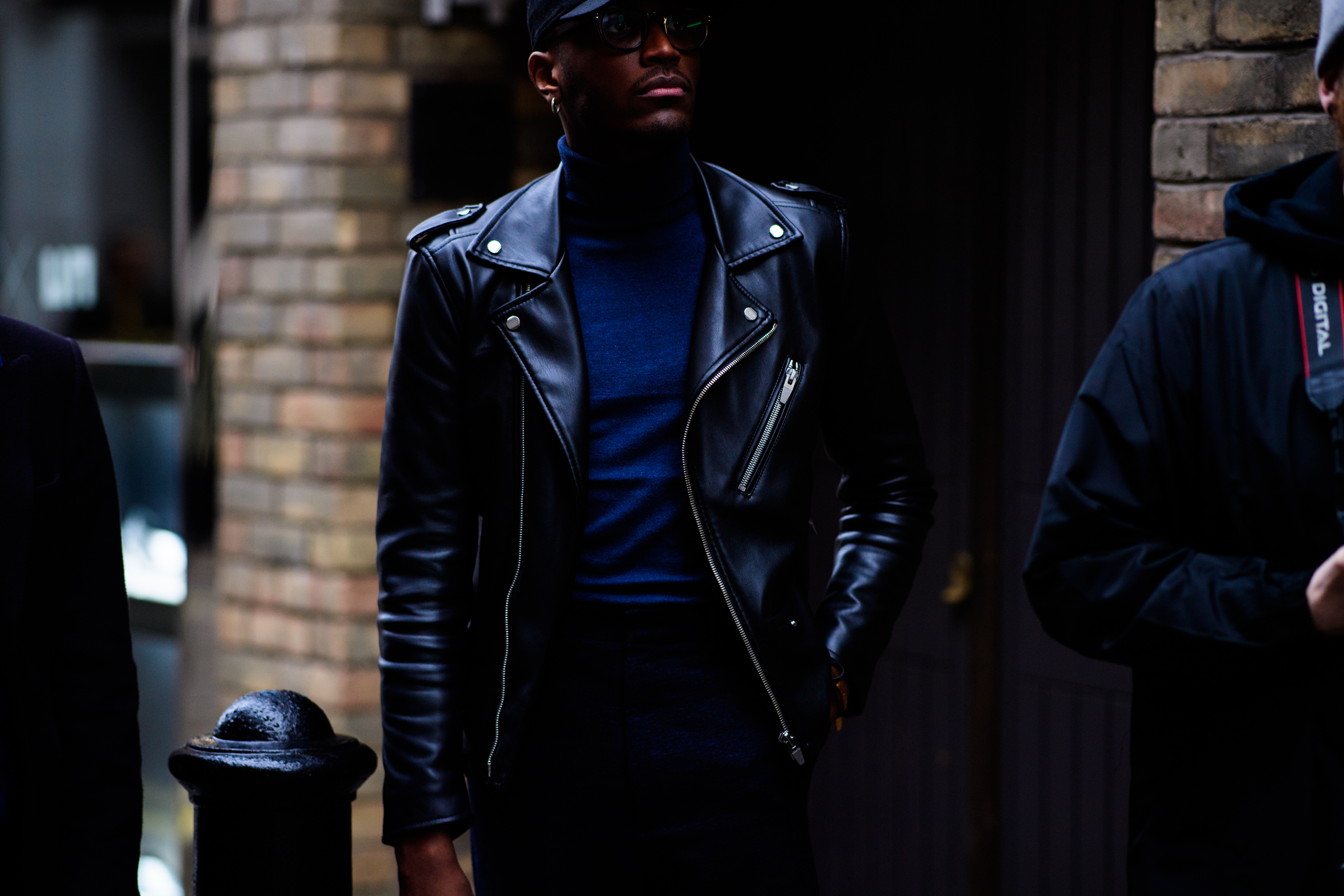 African man wearing leather jacket