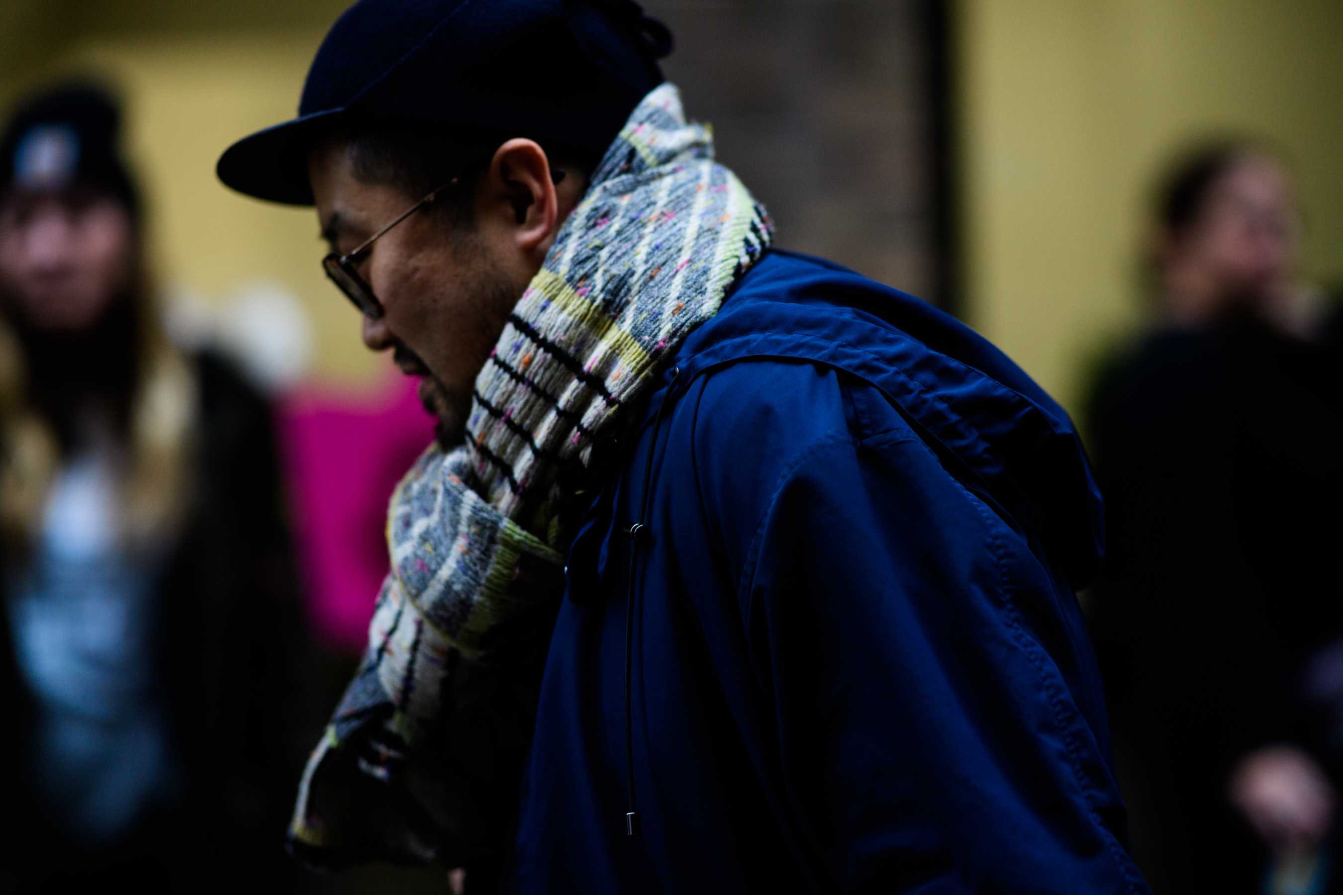 Asian man wearing scarf
