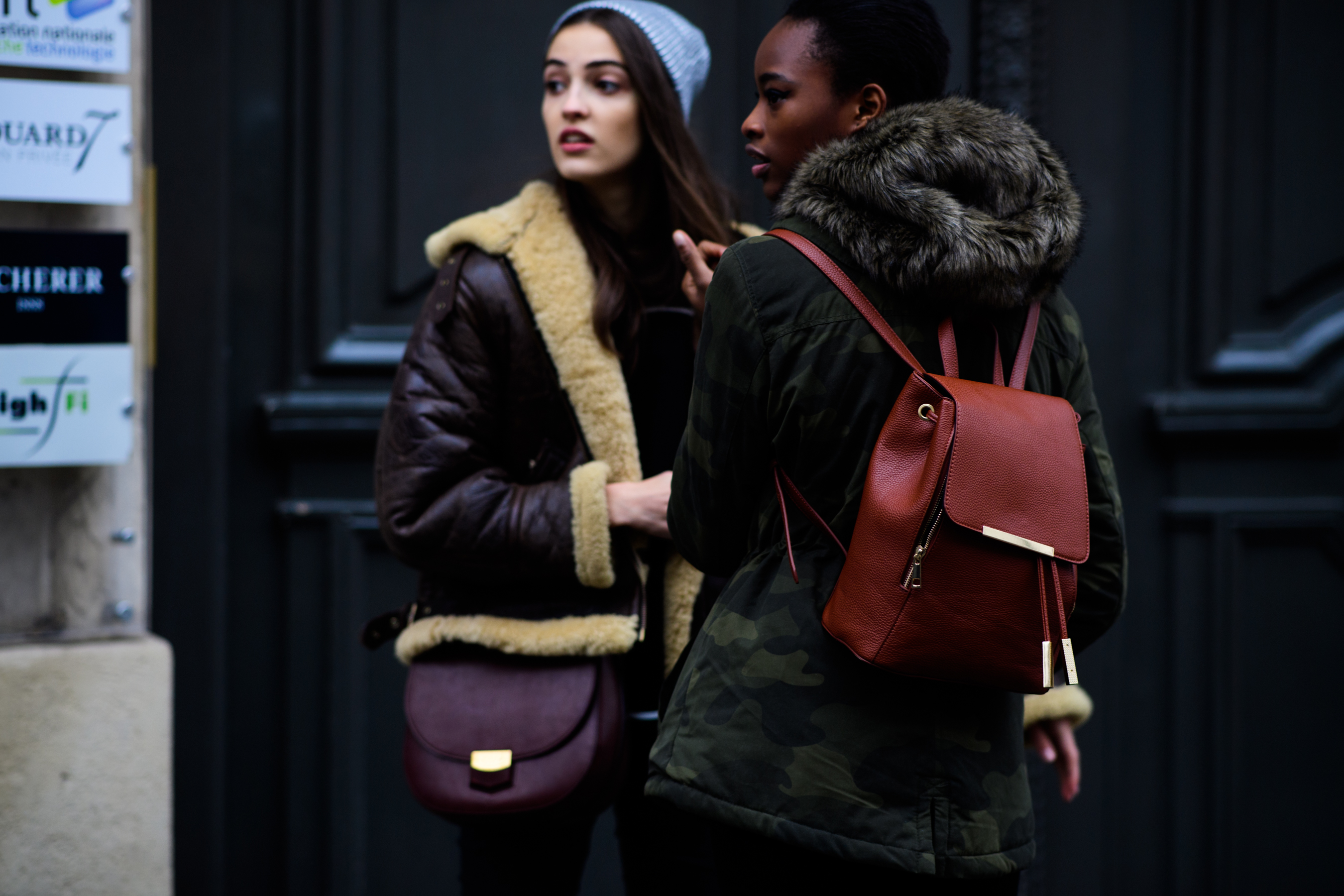 Woman wearing brown backpack