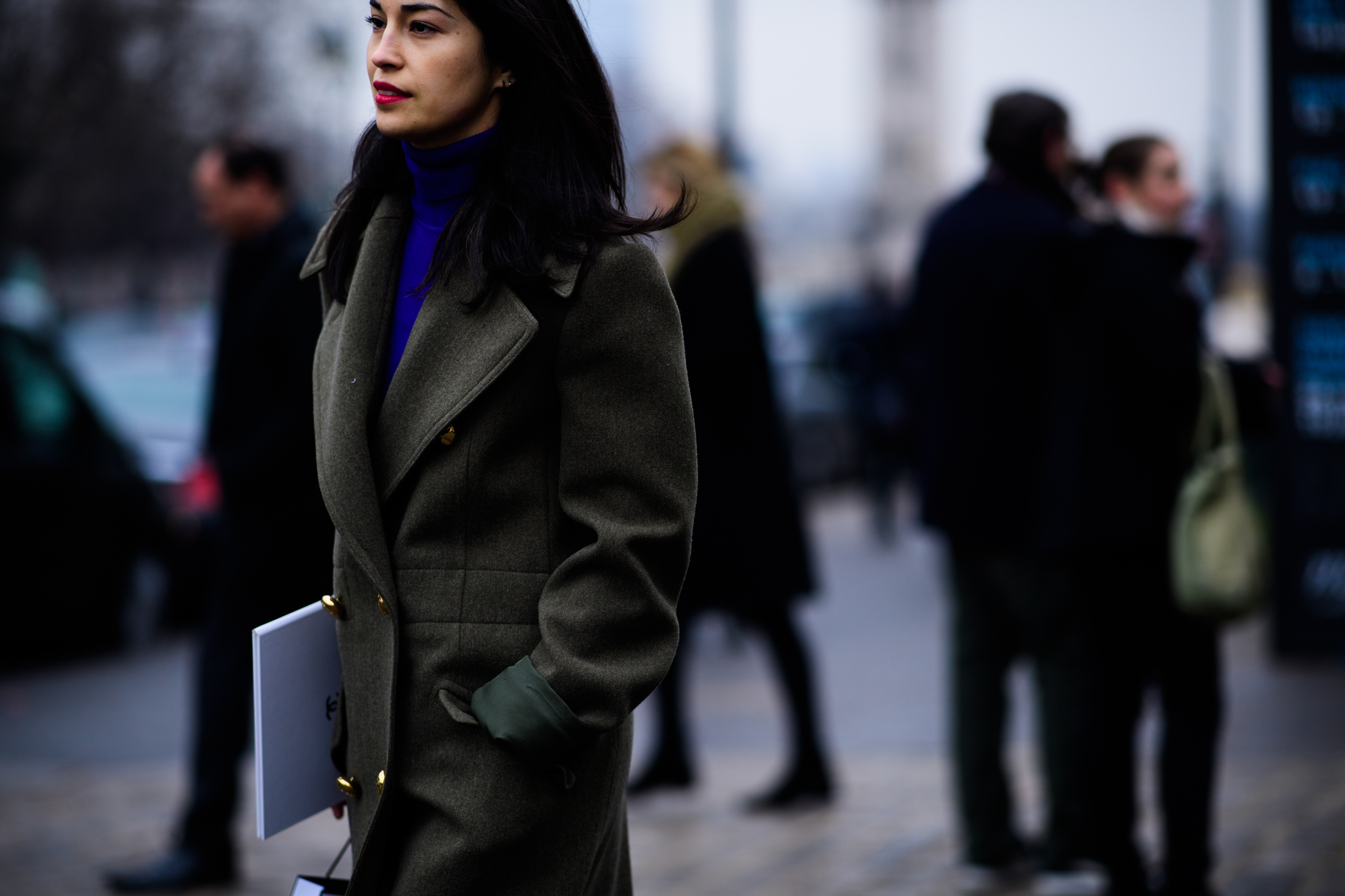 Woman wearing green coat