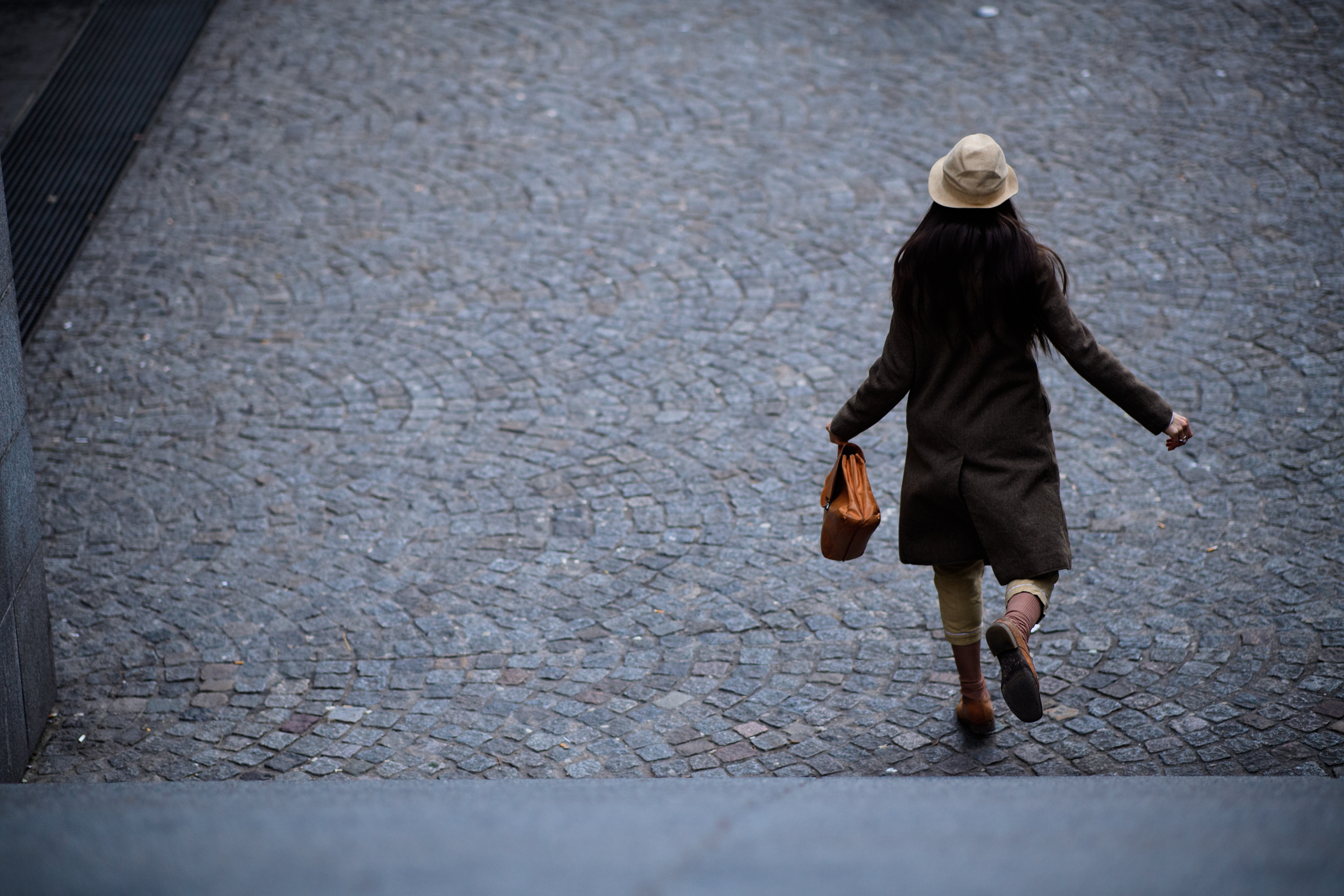 Woman wearing brown clothes