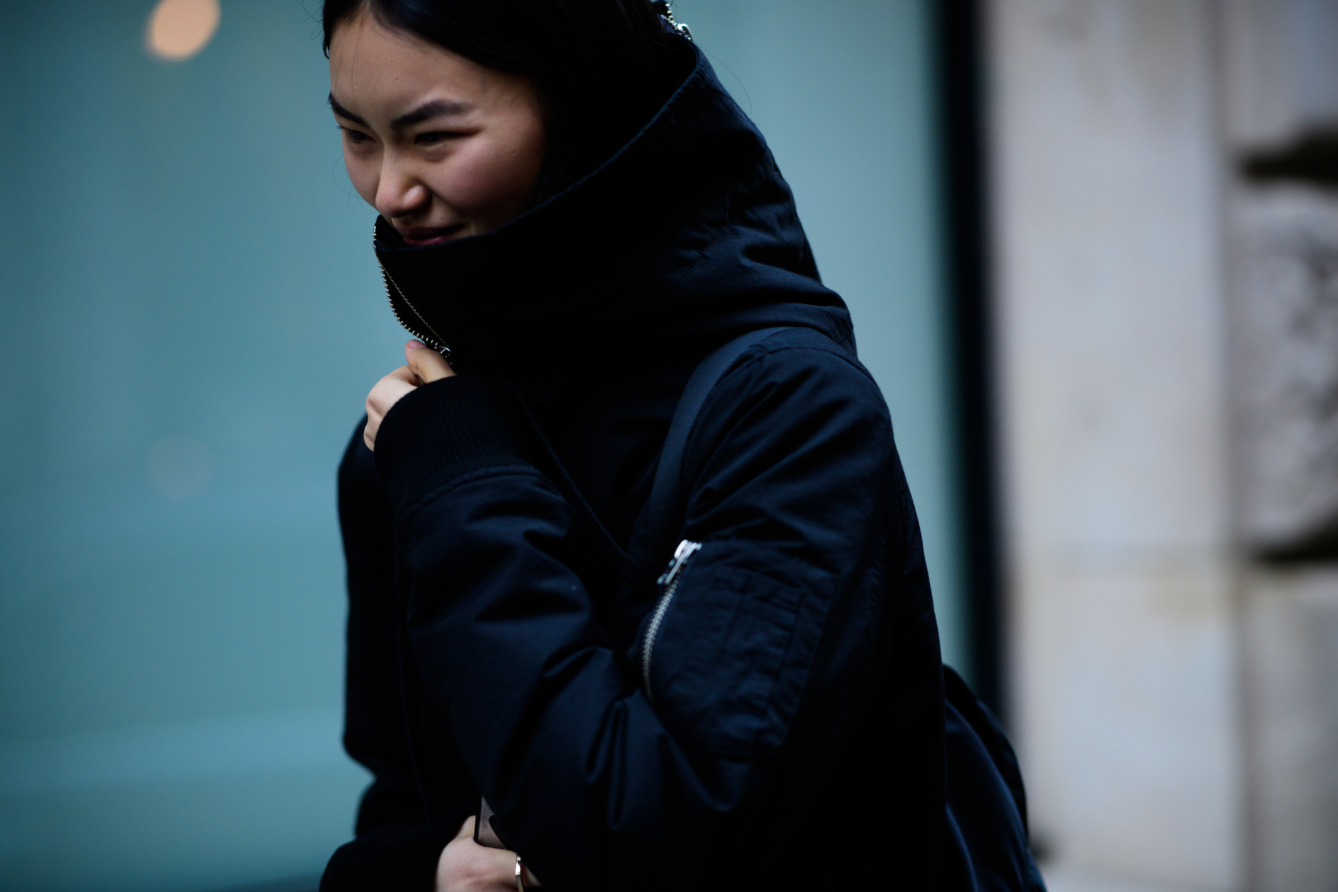Asian woman wearing black clothes