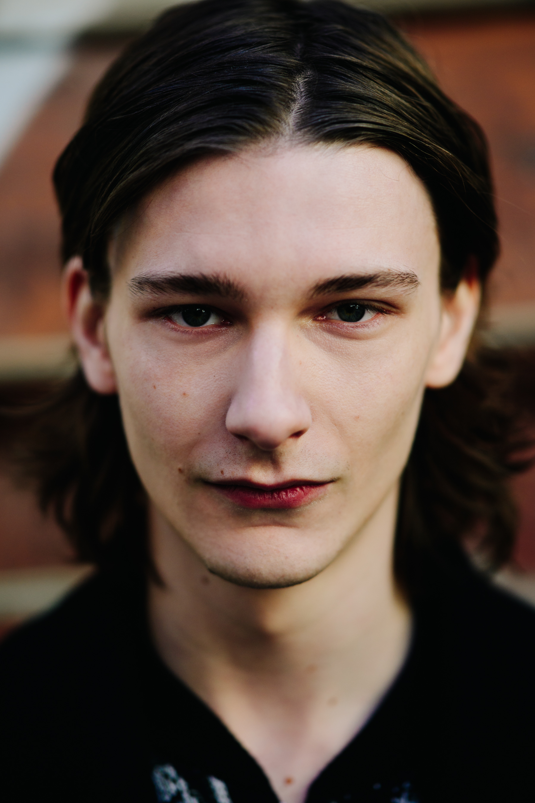 Portrait of male model with long hair