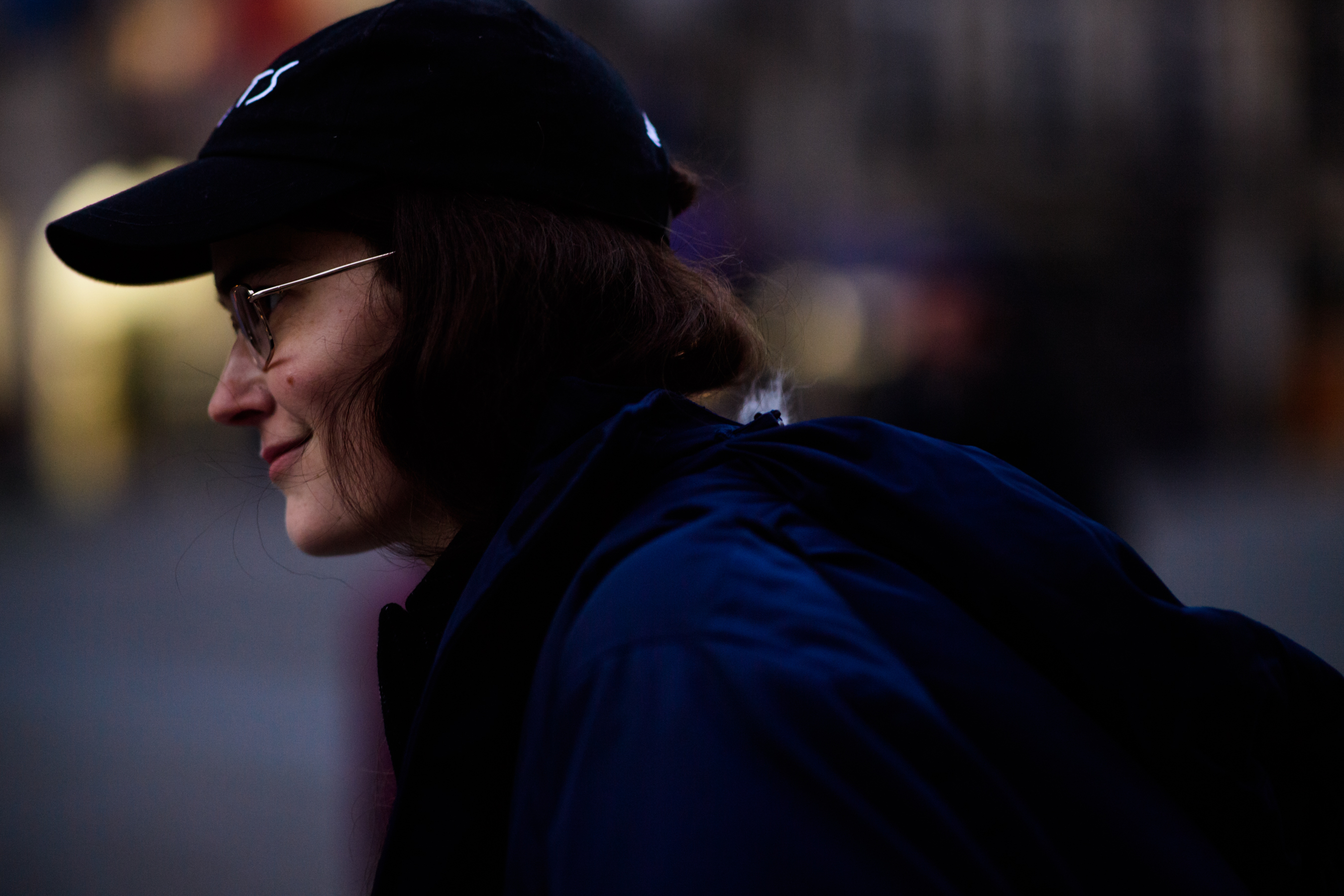 Woman with black cap