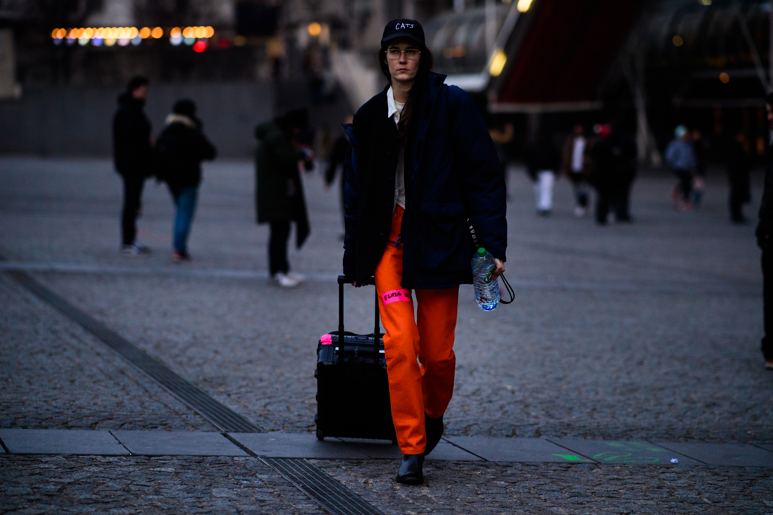 Woman wearing orange pants