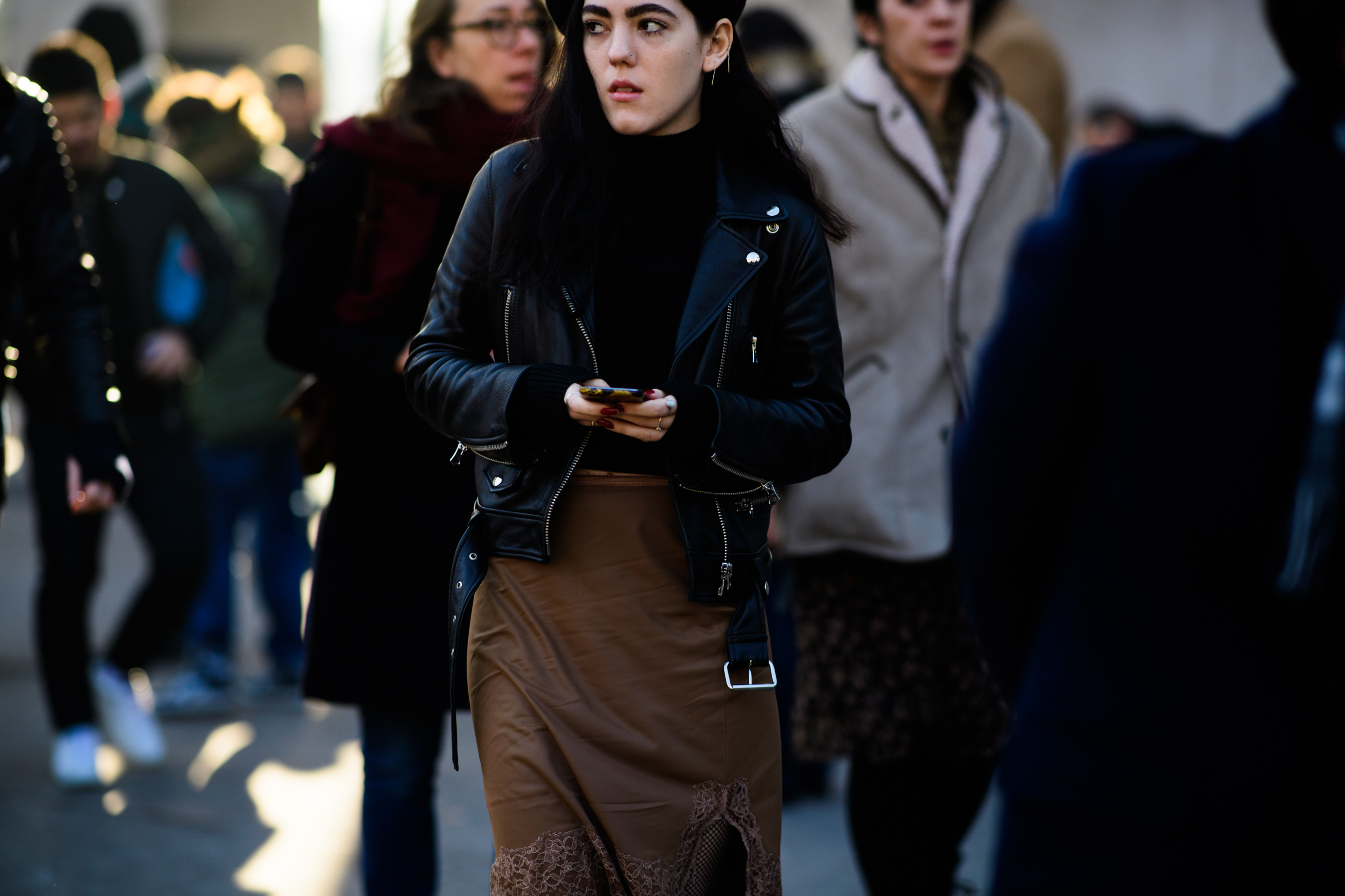 Woman wearing leather jacket