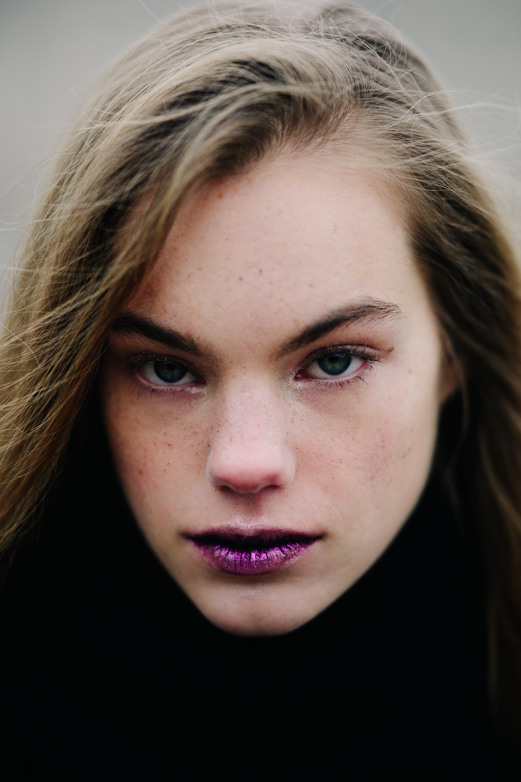 Portrait of model with violet lipstick