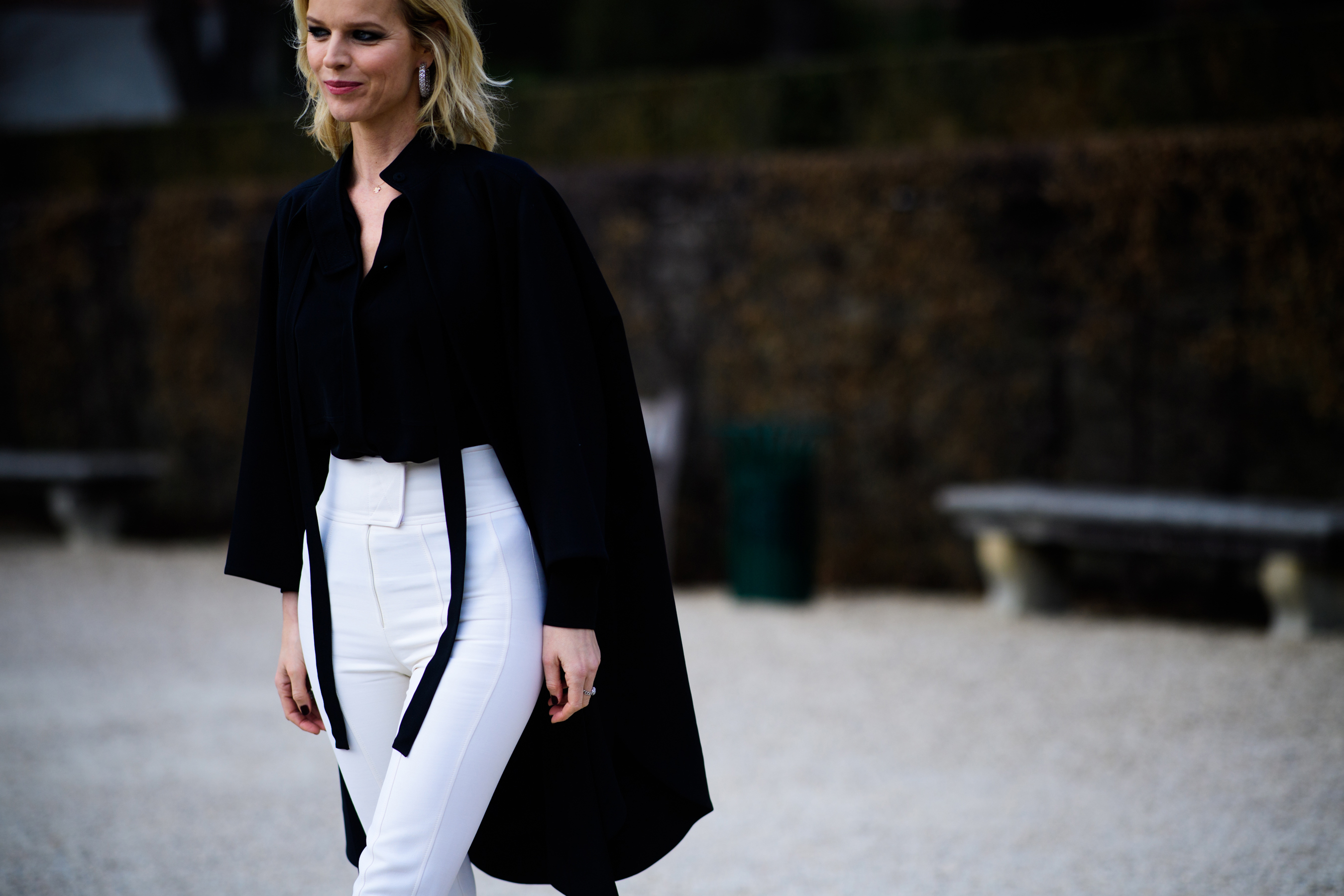 Woman wearing white pants