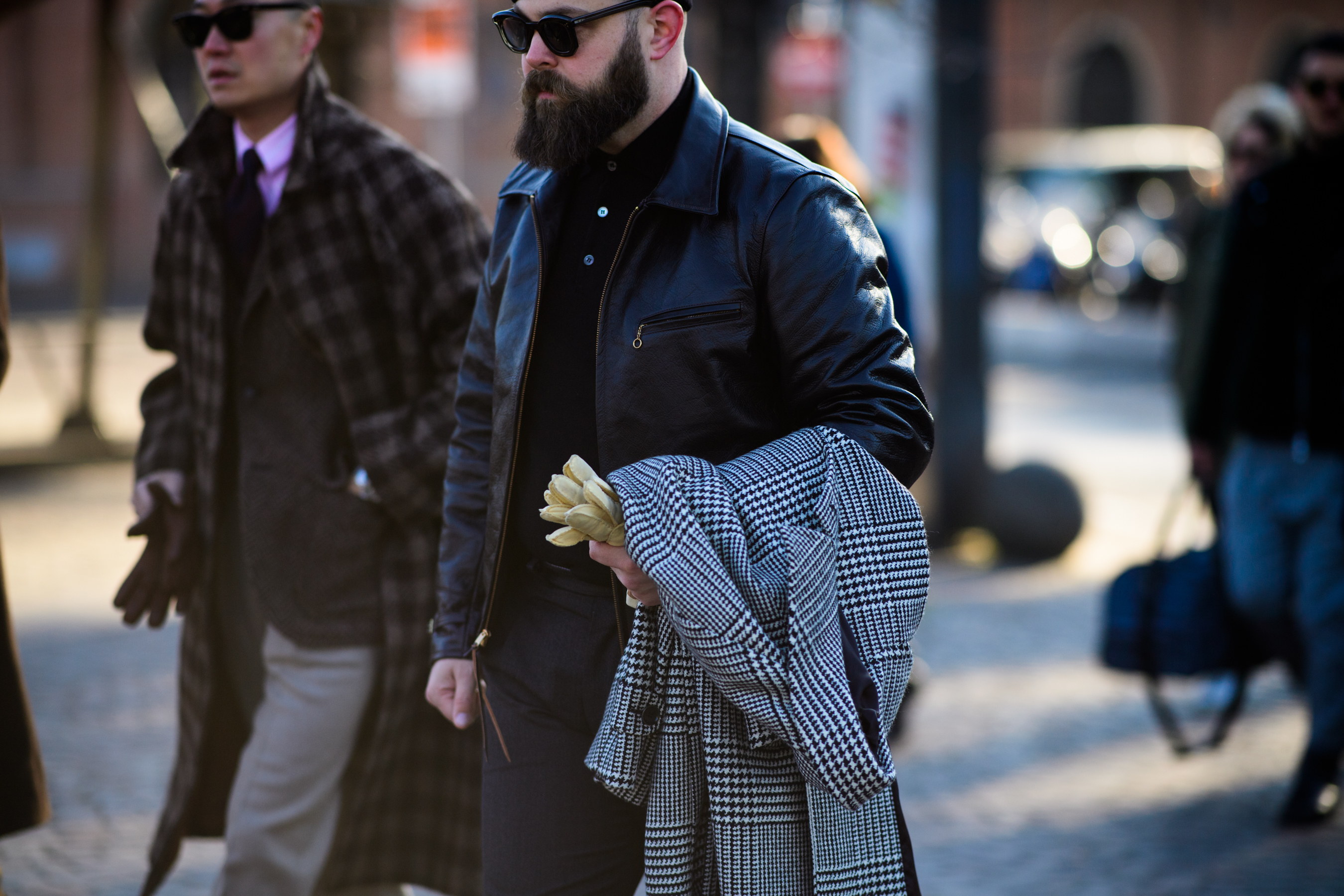 Man with beard wearing leather jacket