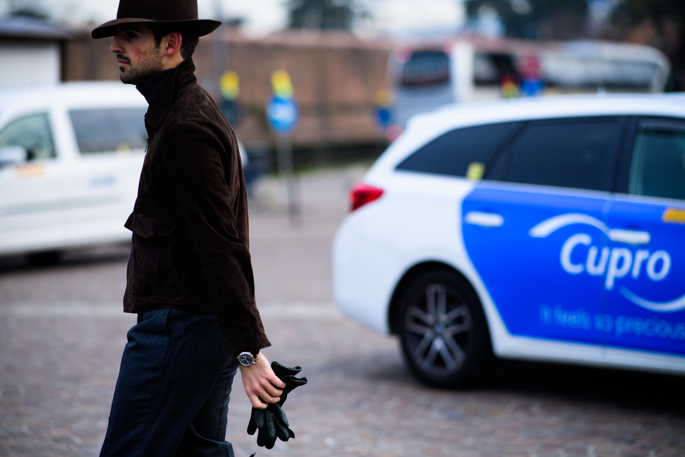 Man wearing brown hat