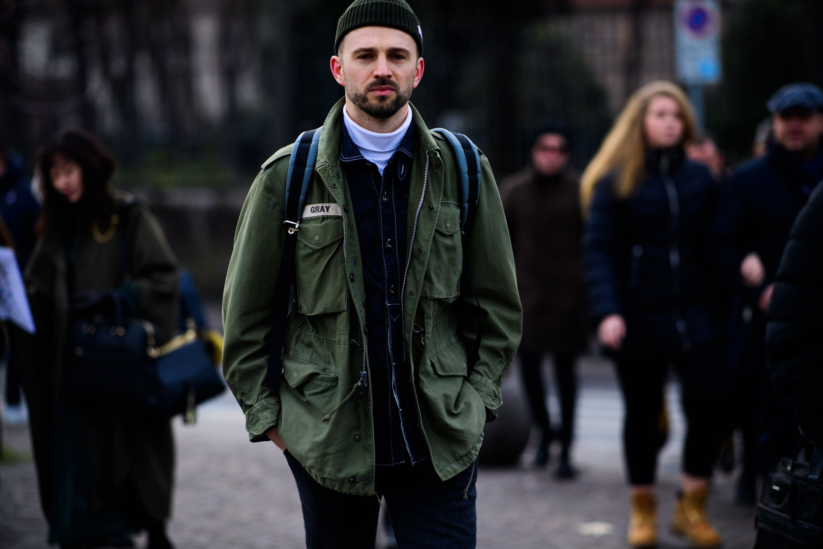 Man wearing green jacket