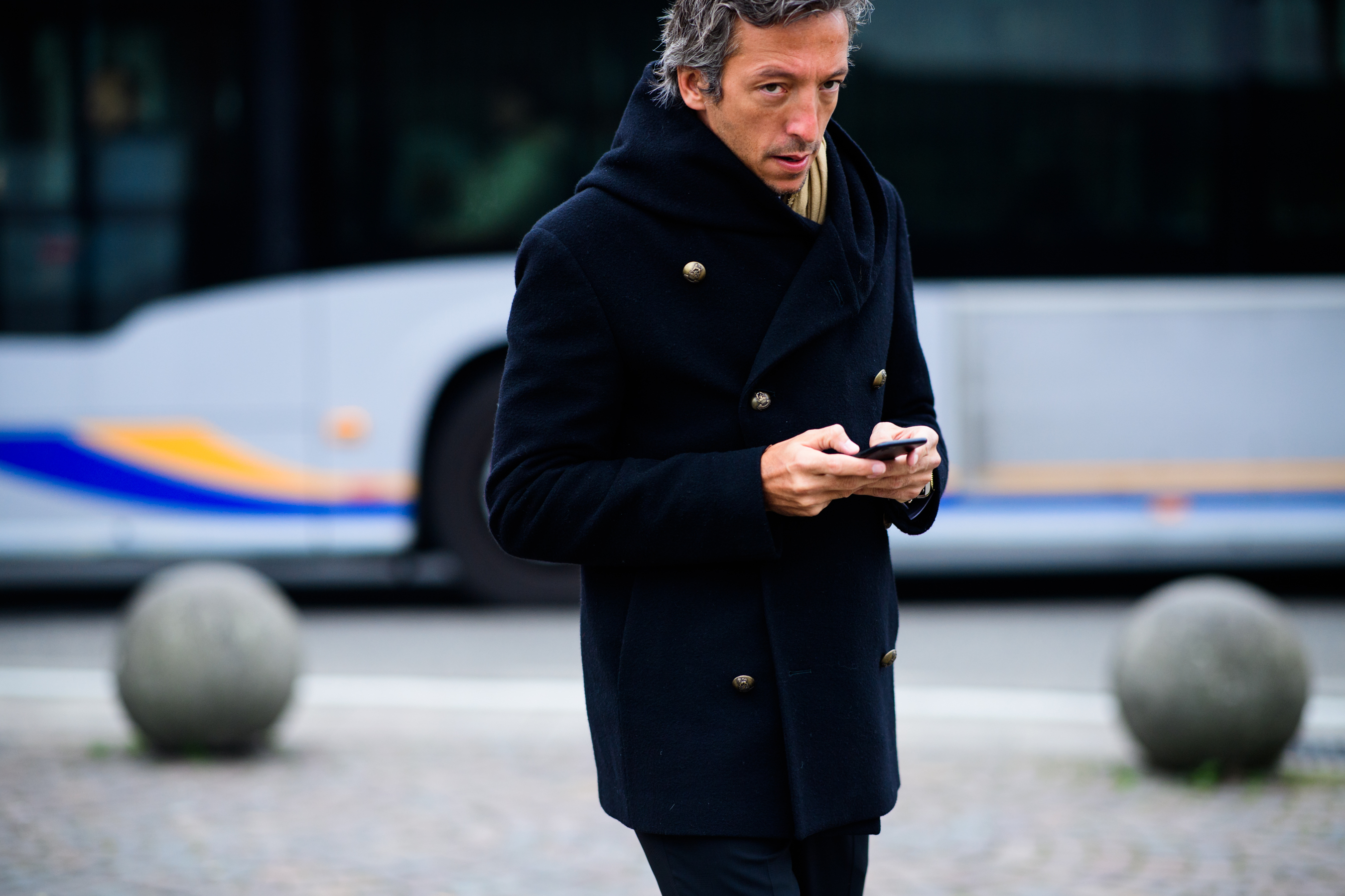 Man wearing black coat