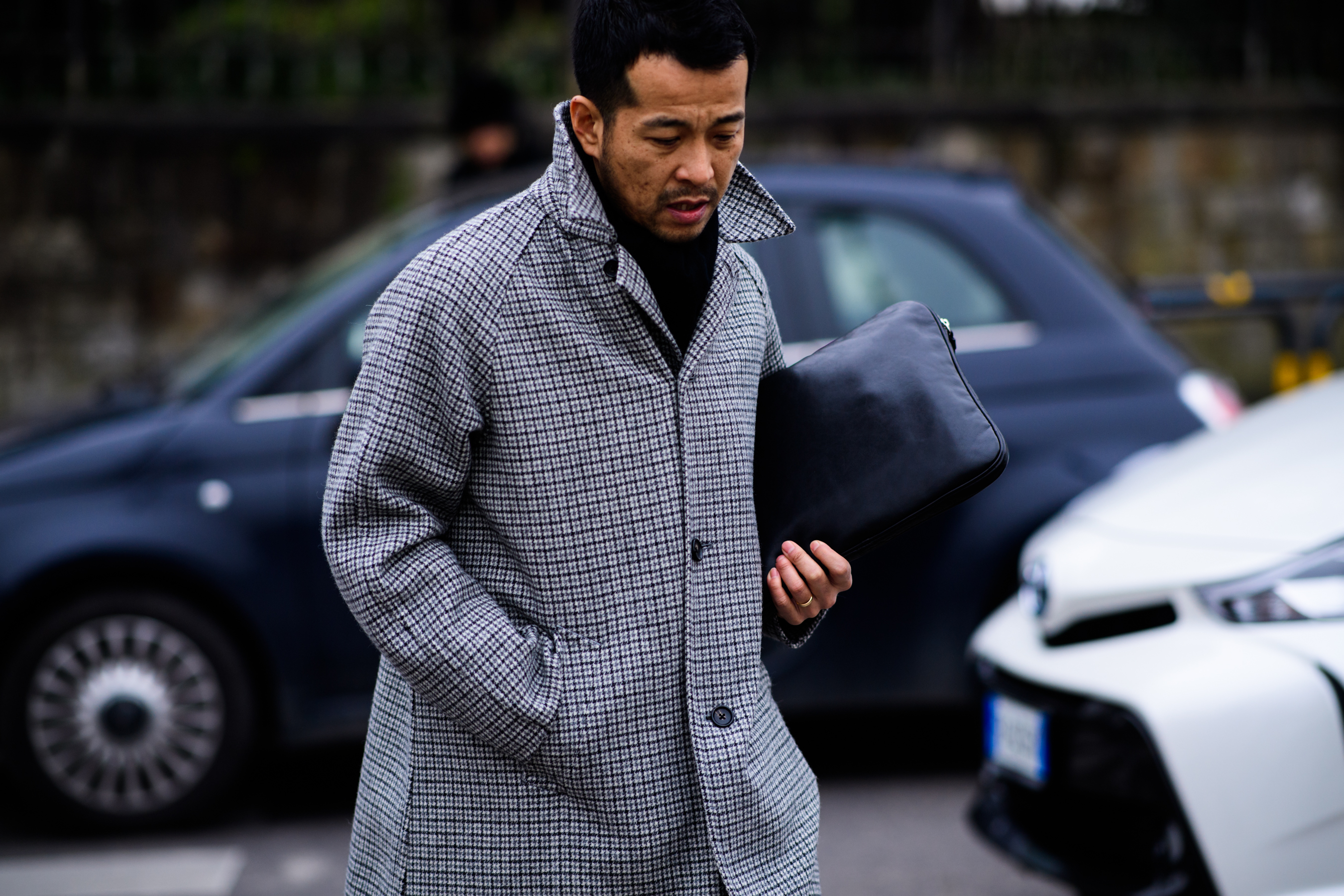 Man wearing white coat