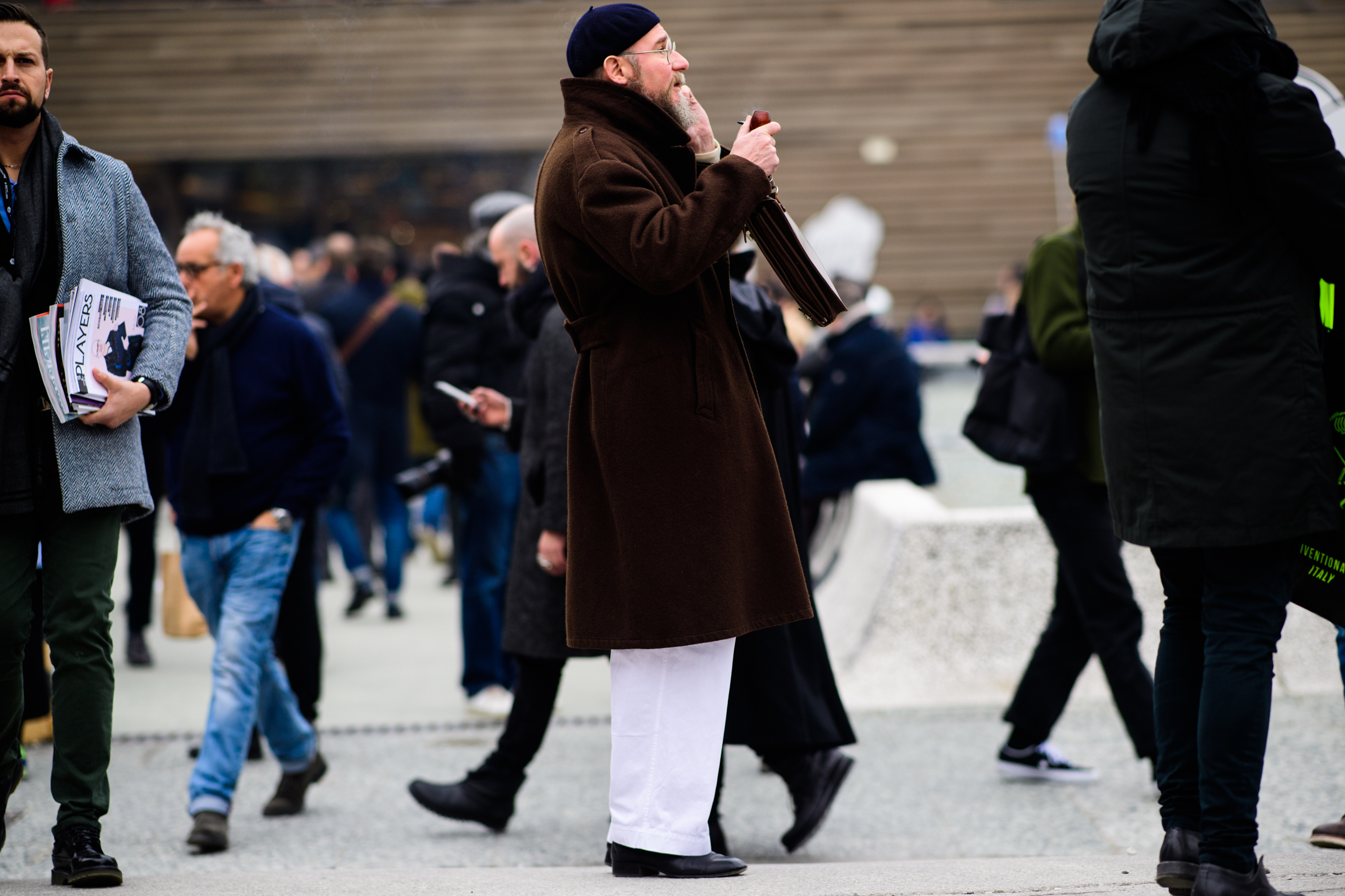 Man wearing brown coat