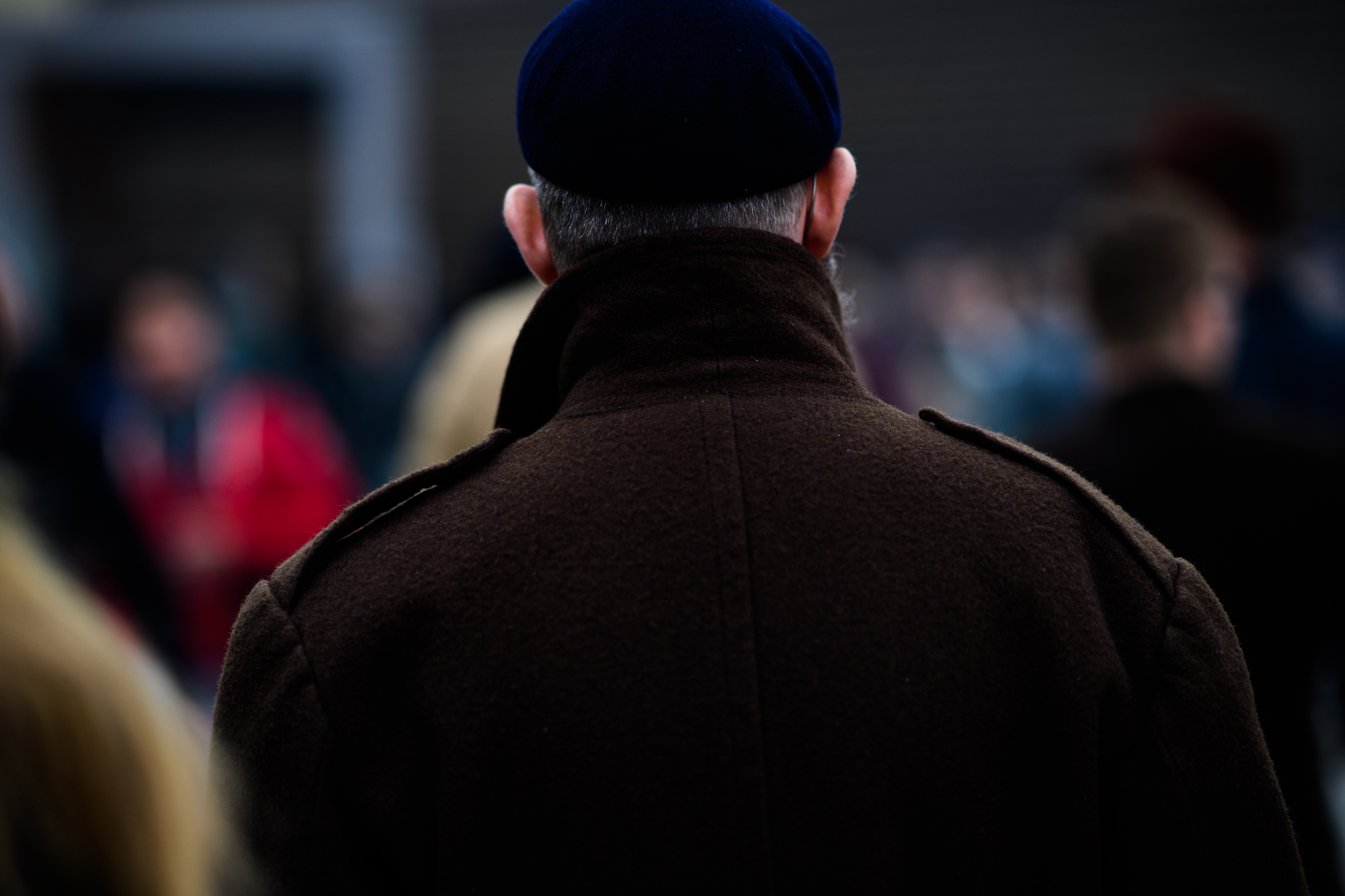 Man wearing brown coat