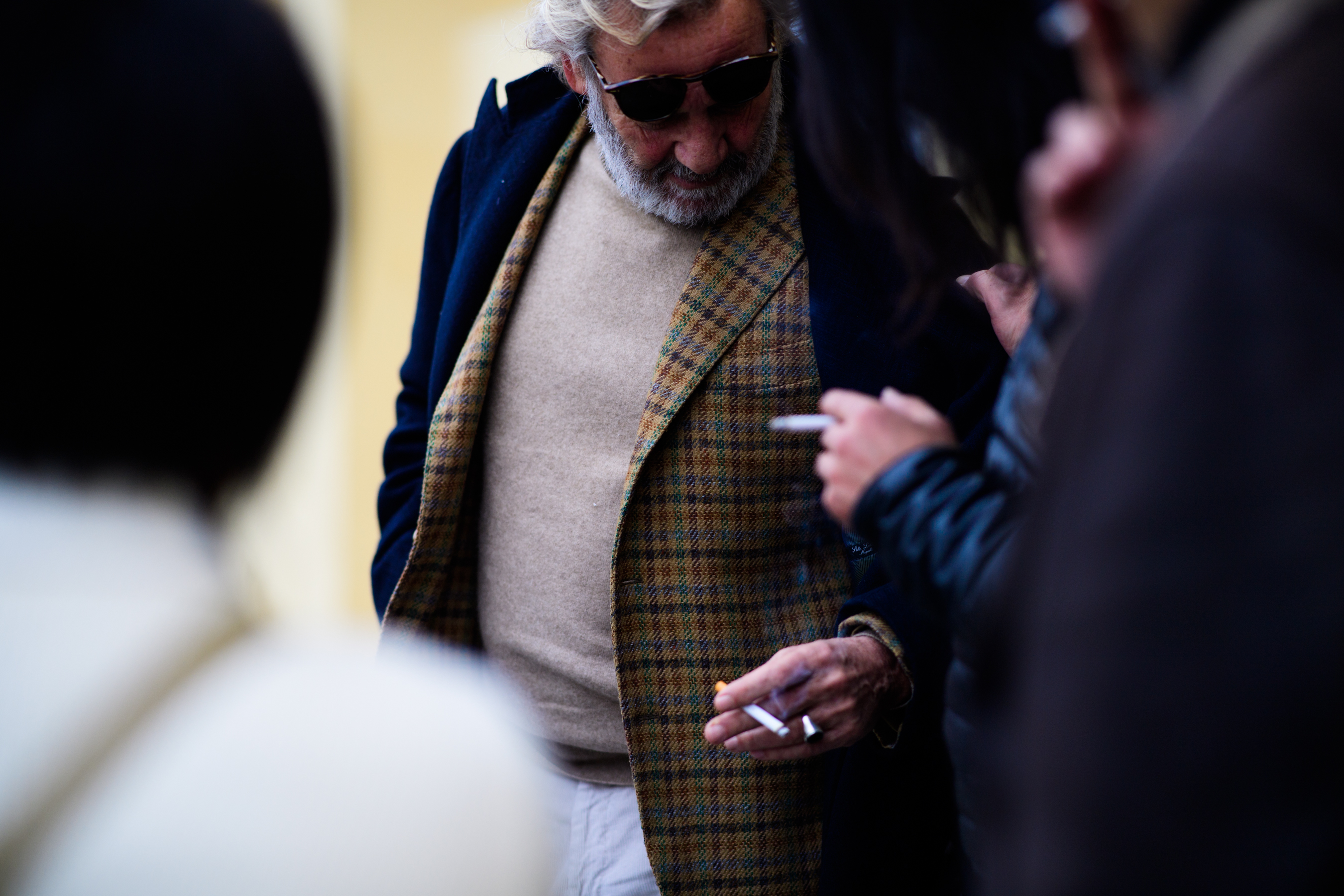 Old man wearing two jackets
